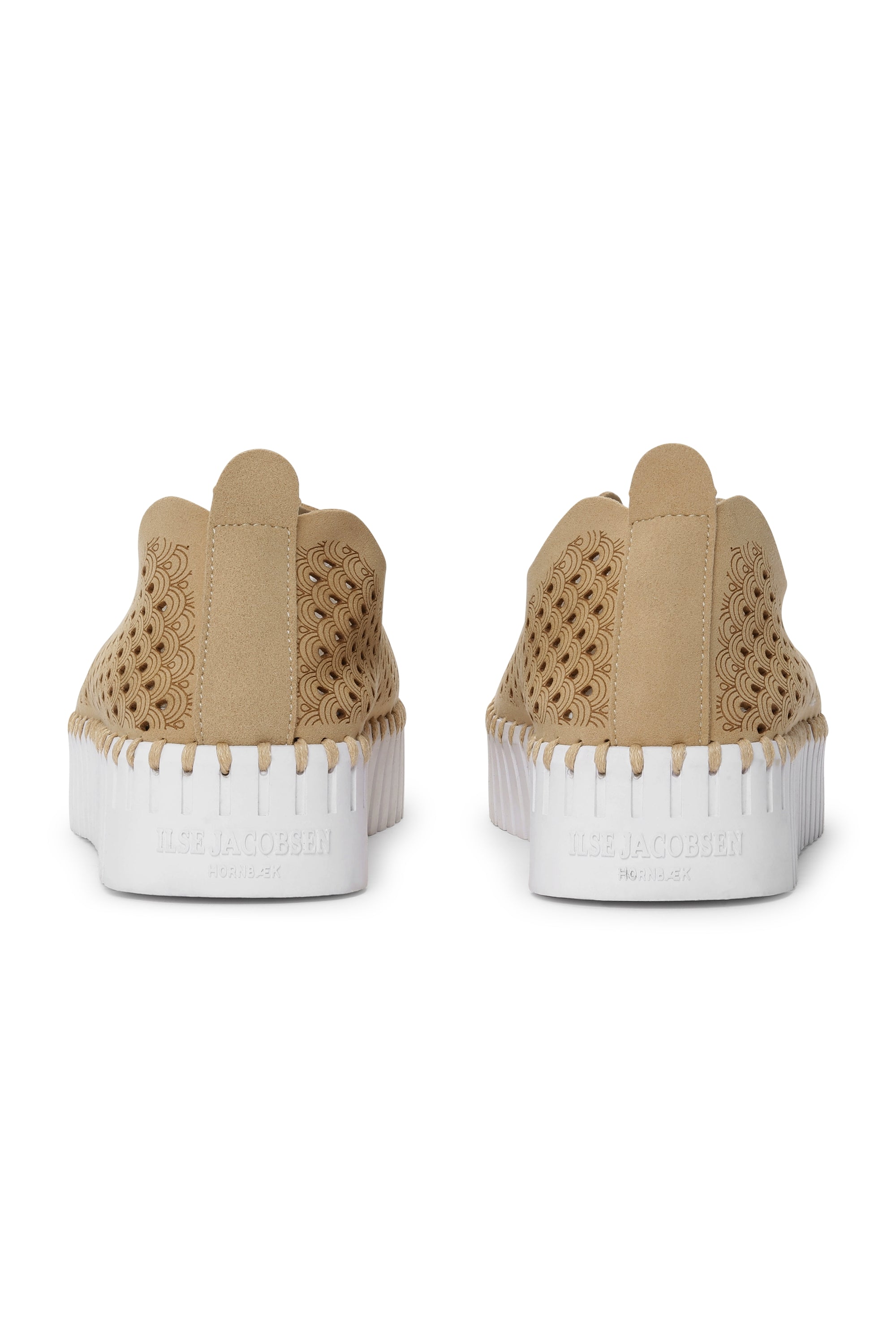 Beige Ilse Jacobsen Hornbæk perforated leather slip-on shoes with white platform soles, viewed from behind.
