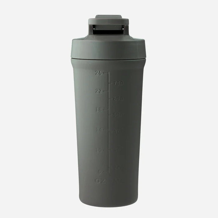 Dark gray shaker bottle with measurement markings on a light gray background