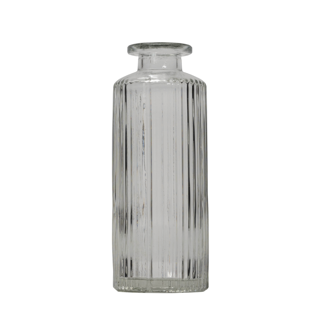 Clear glass vase with vertical ribbed texture.