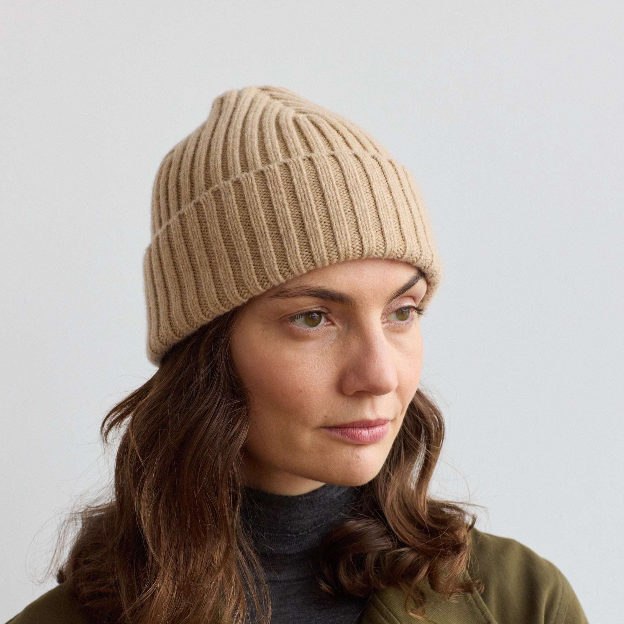 Beige ribbed knit beanie. Soft, warm winter hat.