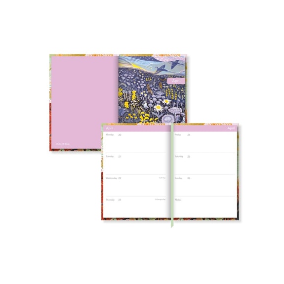 Two planners with colorful designs on a white background