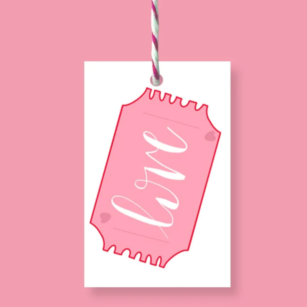 Pink ticket-shaped gift tag with the word "Love" in white script.