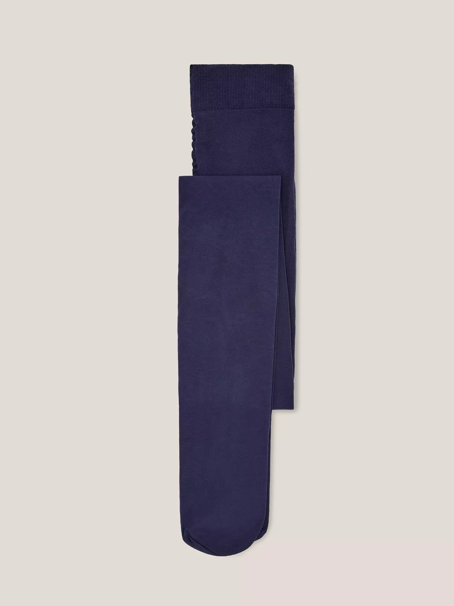 Pair of dark blue children's tights folded.