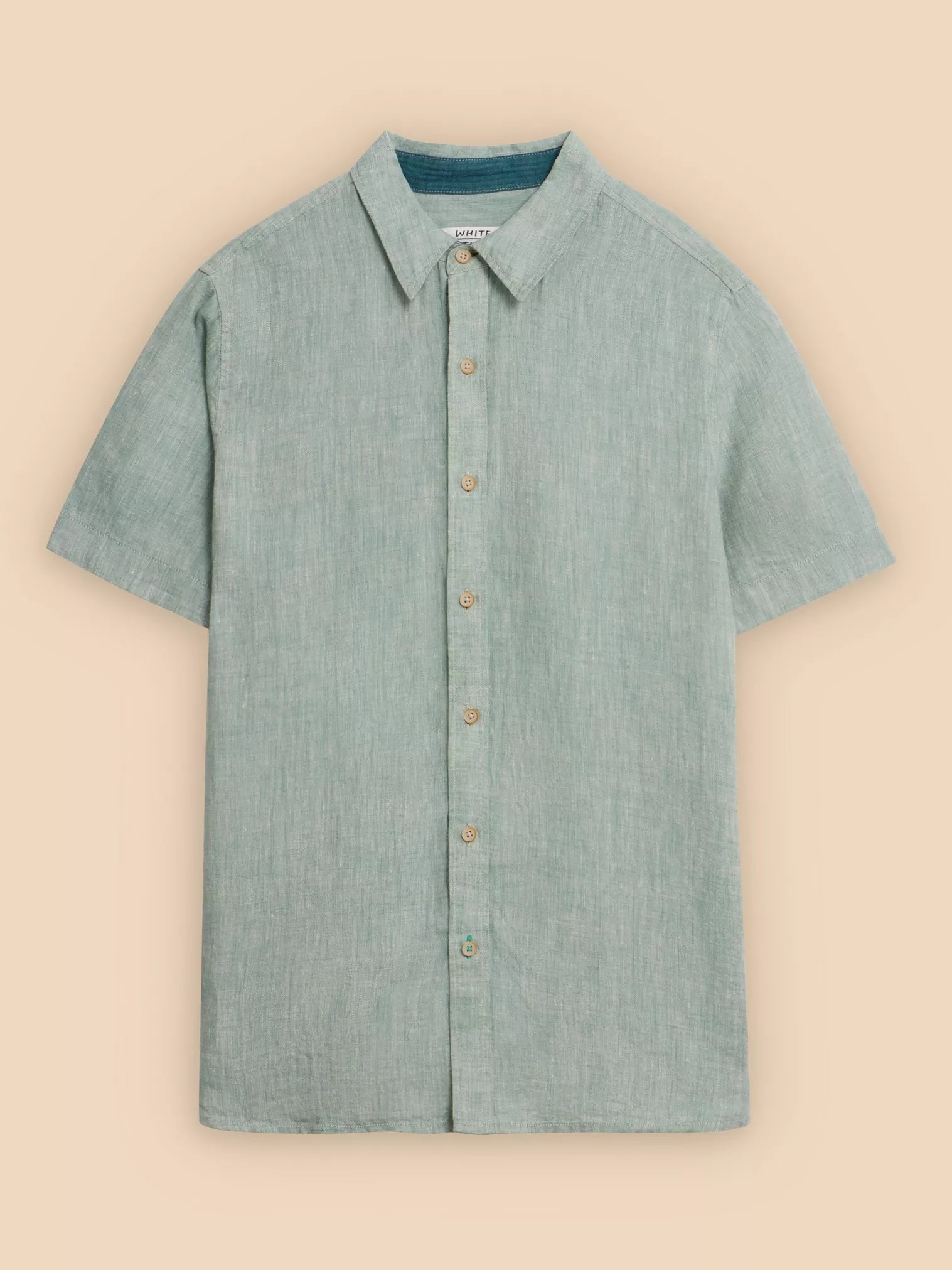Seafoam green linen short-sleeve button-down shirt. The shirt has a textured fabric and a classic collar.