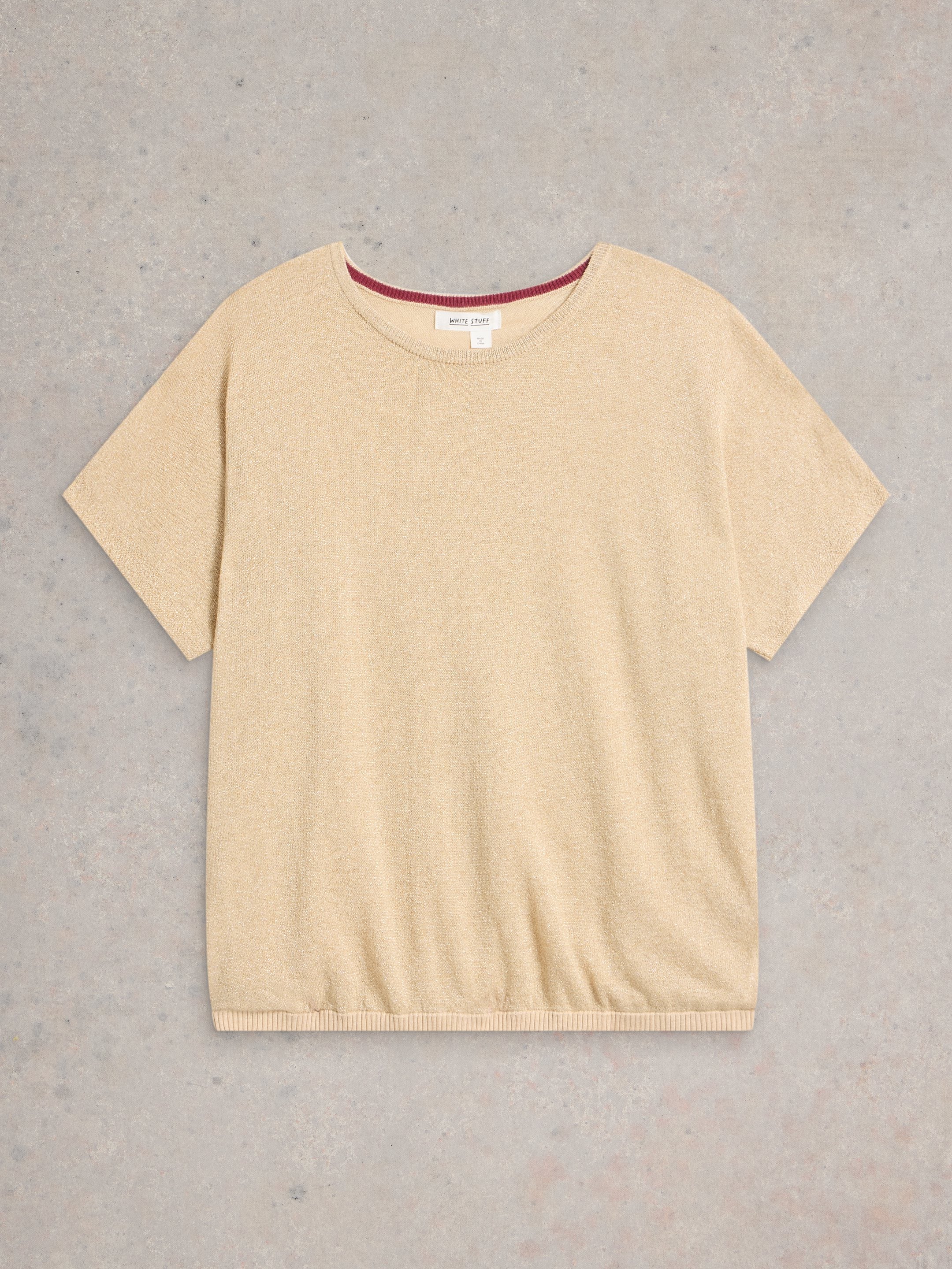 Beige short-sleeved knit top with a round neckline and ribbed hem.