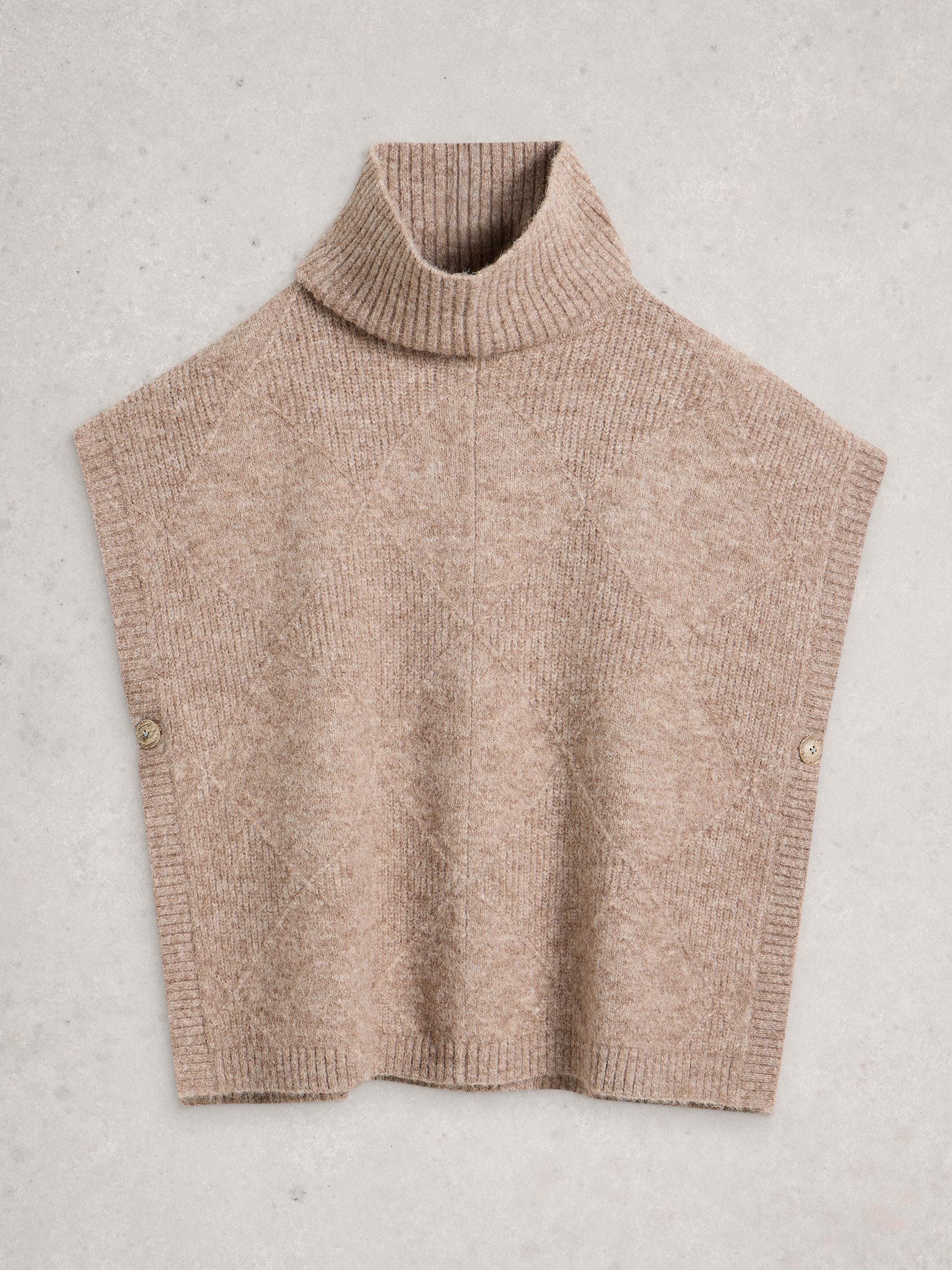 Beige knitted vest on a light gray background