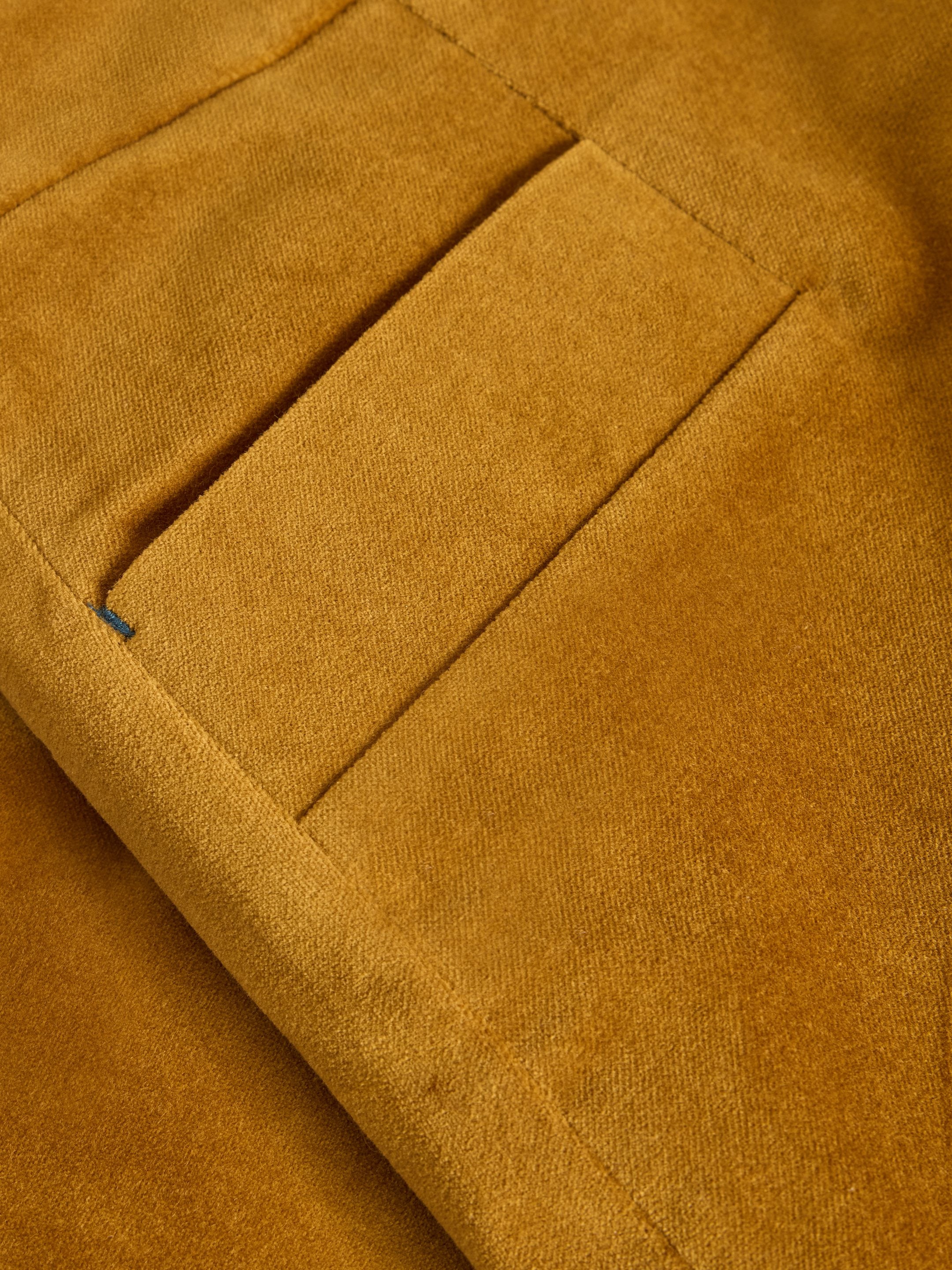 Close-up of brown fabric with stitching details