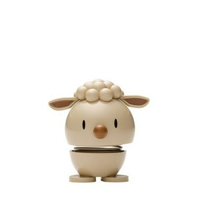 Beige bobblehead sheep toy with small brown ears and nose, segmented body, and small feet.