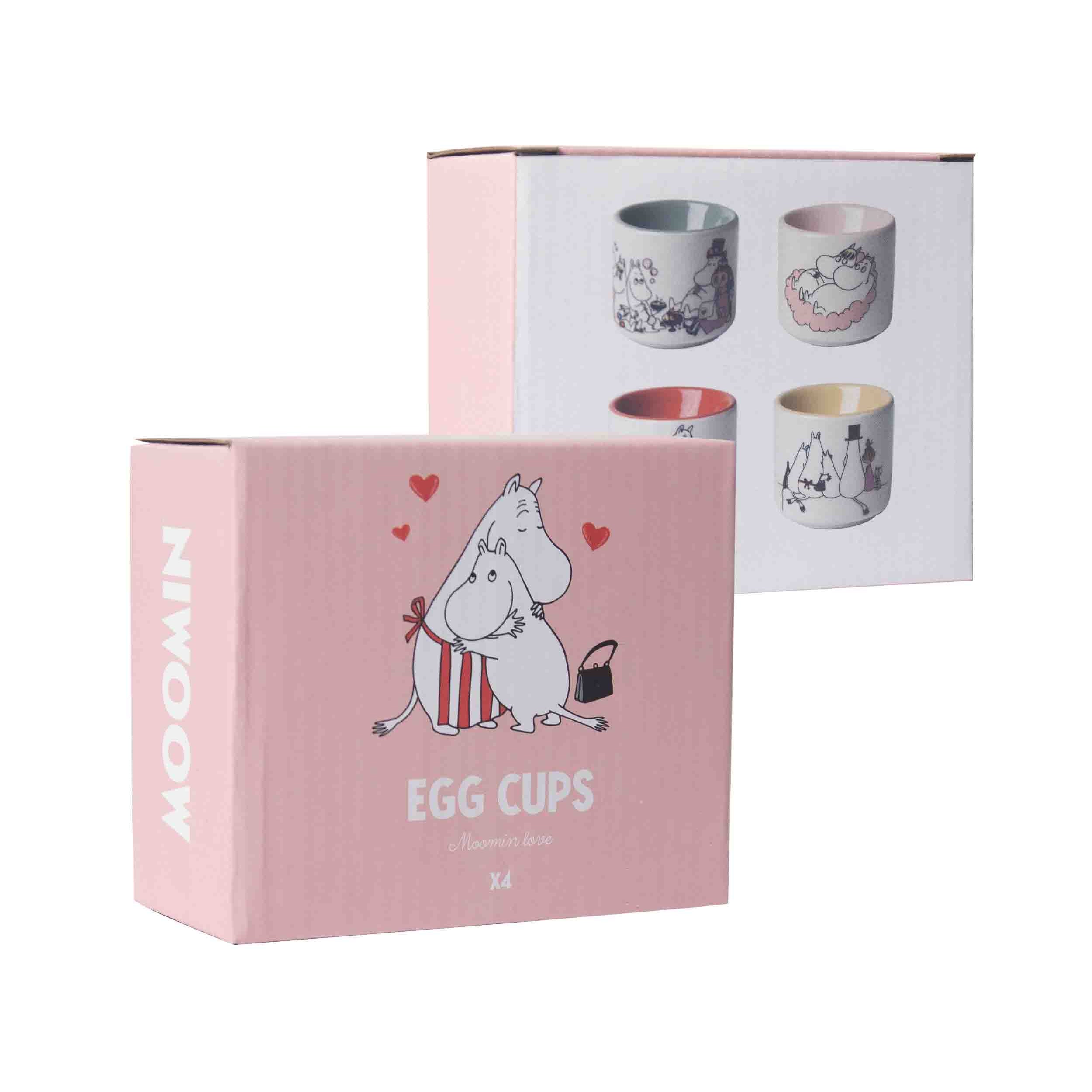 Pink box of four Moomin egg cups.  Each cup features a different Moomin character illustration.