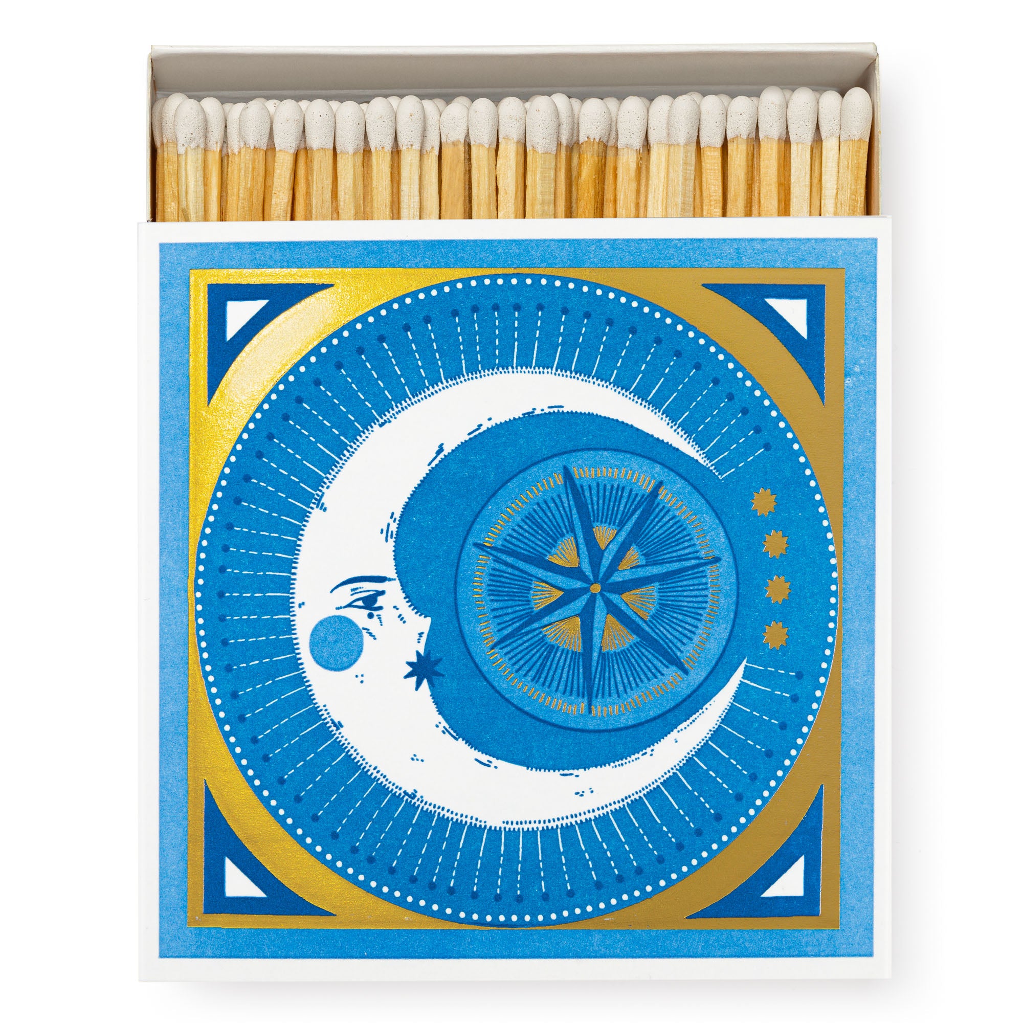 Box of matches with a celestial design. The blue and gold box features a crescent moon, star, and compass rose.