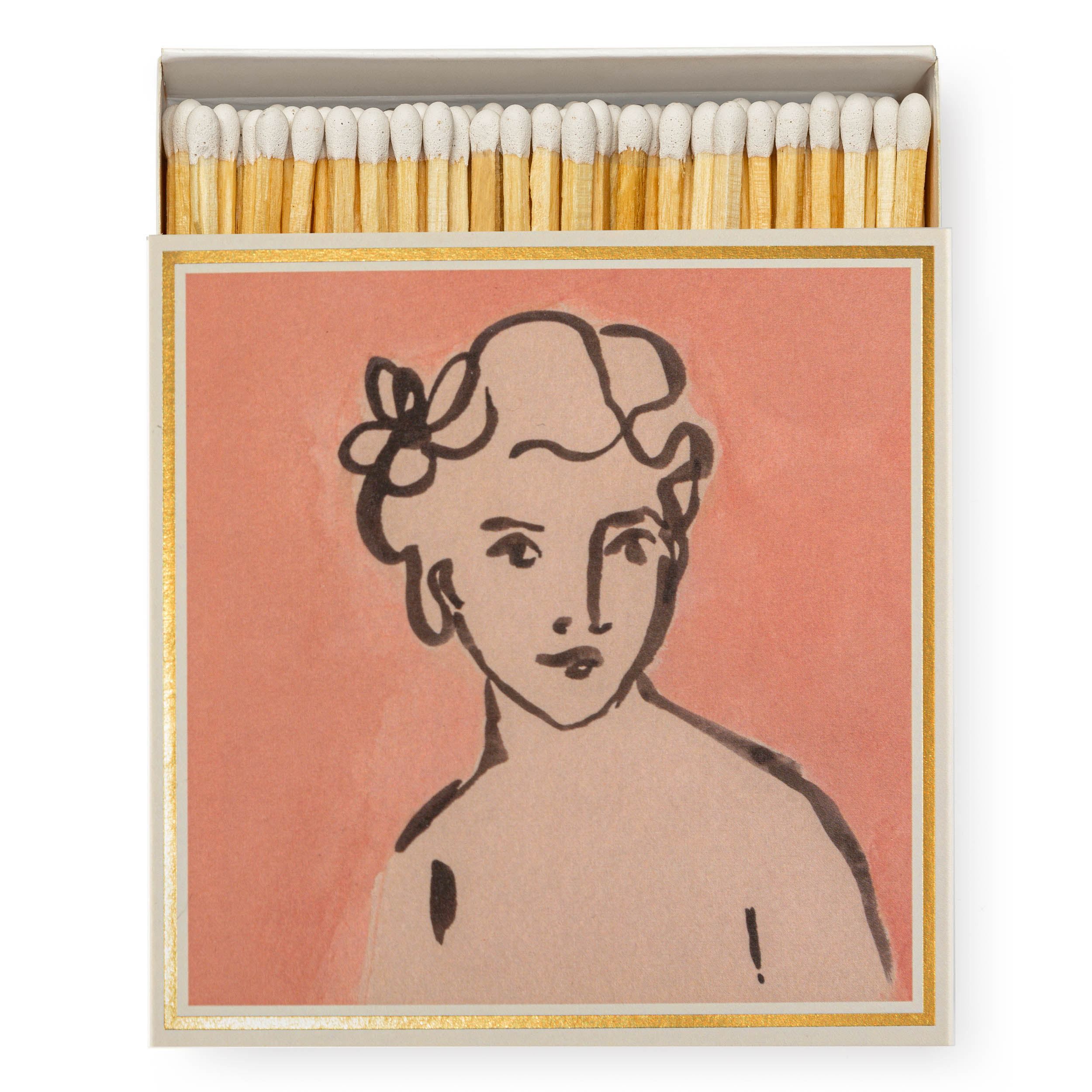 Matchbox featuring a stylized portrait of a woman with upswept hair, depicted in black line art on a peach background.
