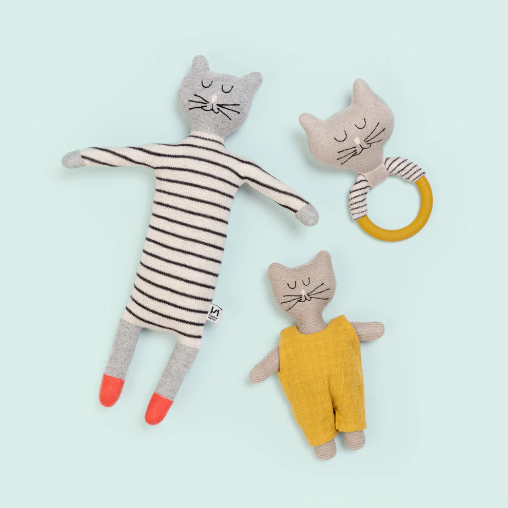 Set of three knitted cat toys: a large striped cat, a smaller cat in yellow overalls, and a cat-shaped teething ring.