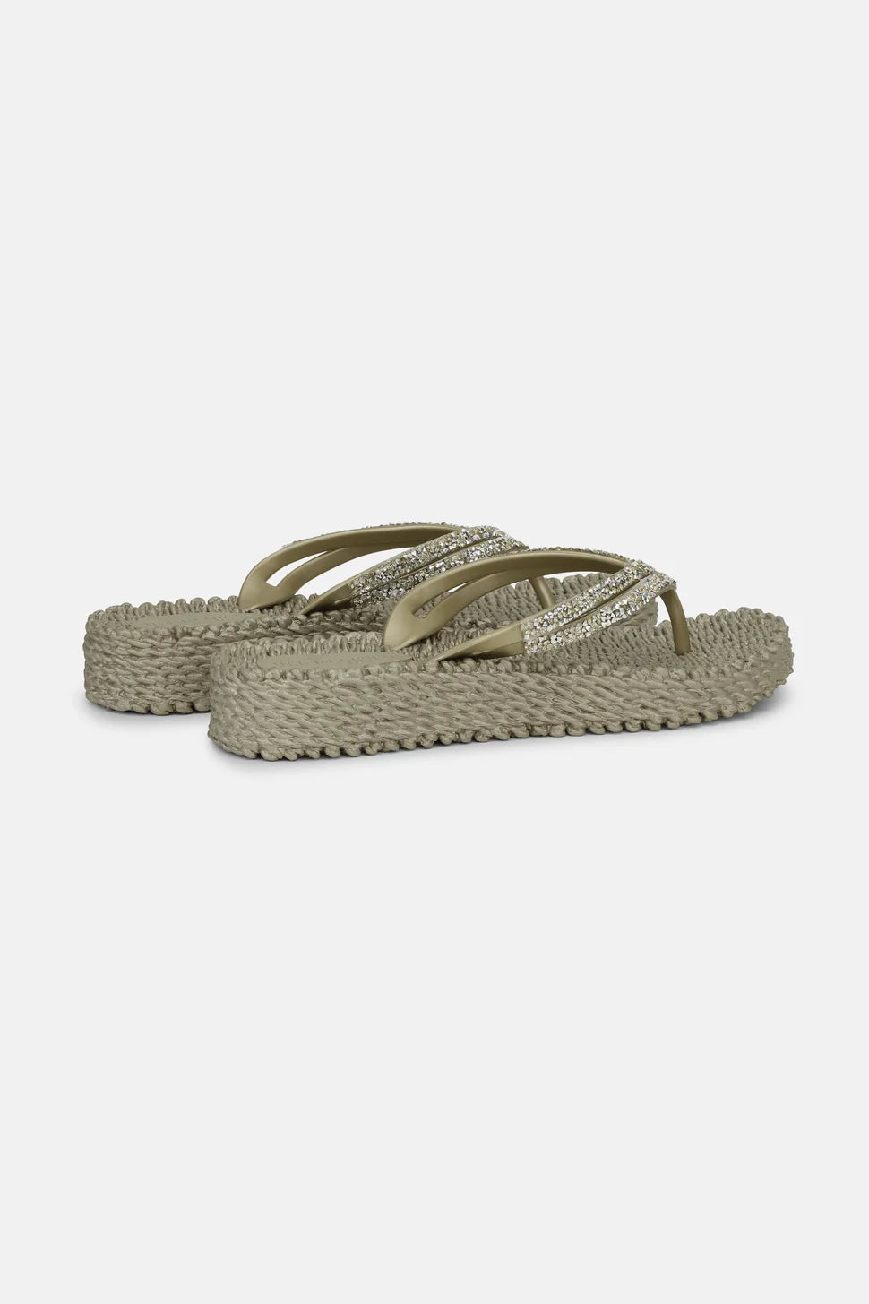 Pair of taupe glitter thong sandals with textured platform soles.