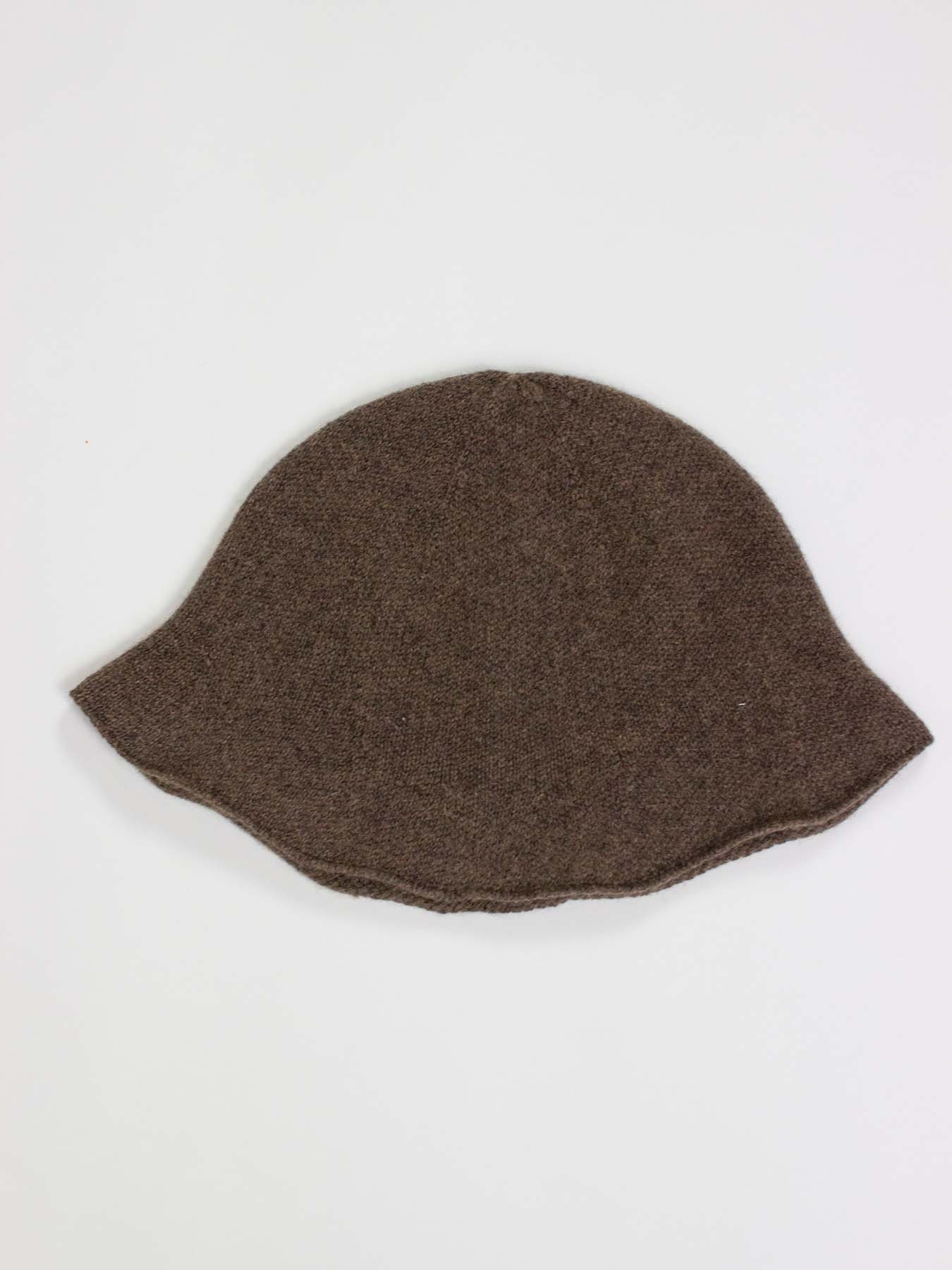 Brown bucket hat on a white background