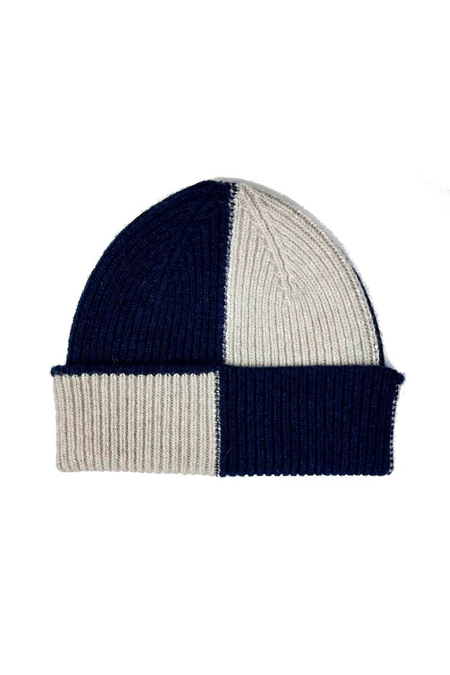 Knit beanie in navy and beige, divided into four quadrants of alternating colors.