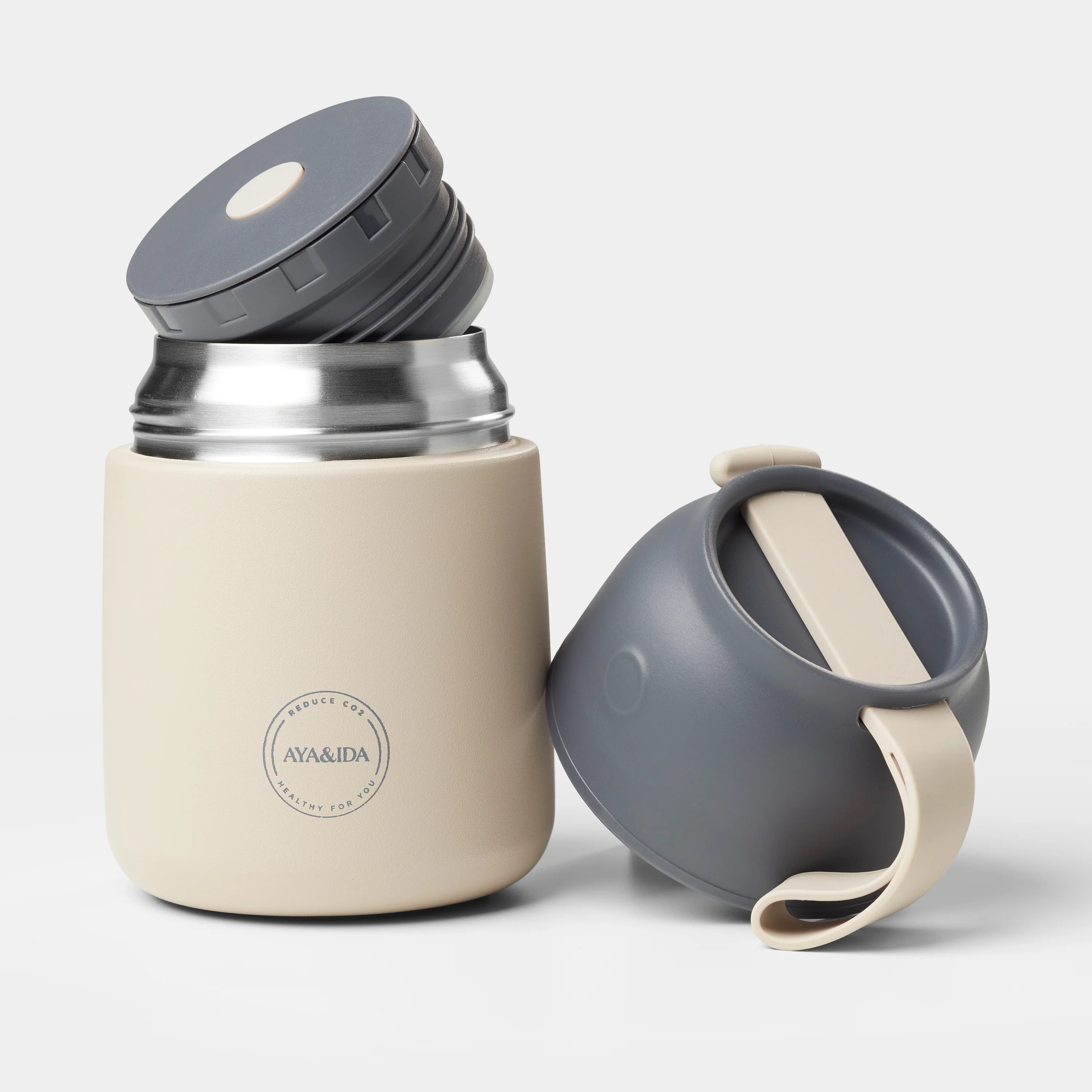 Beige and gray stainless steel food thermos with a removable lid and a separate gray container with a beige handle.