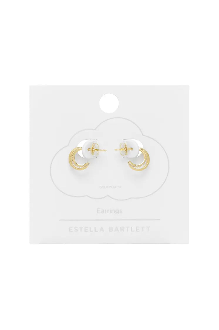 Gold-plated crescent moon earrings with small clear stones.
