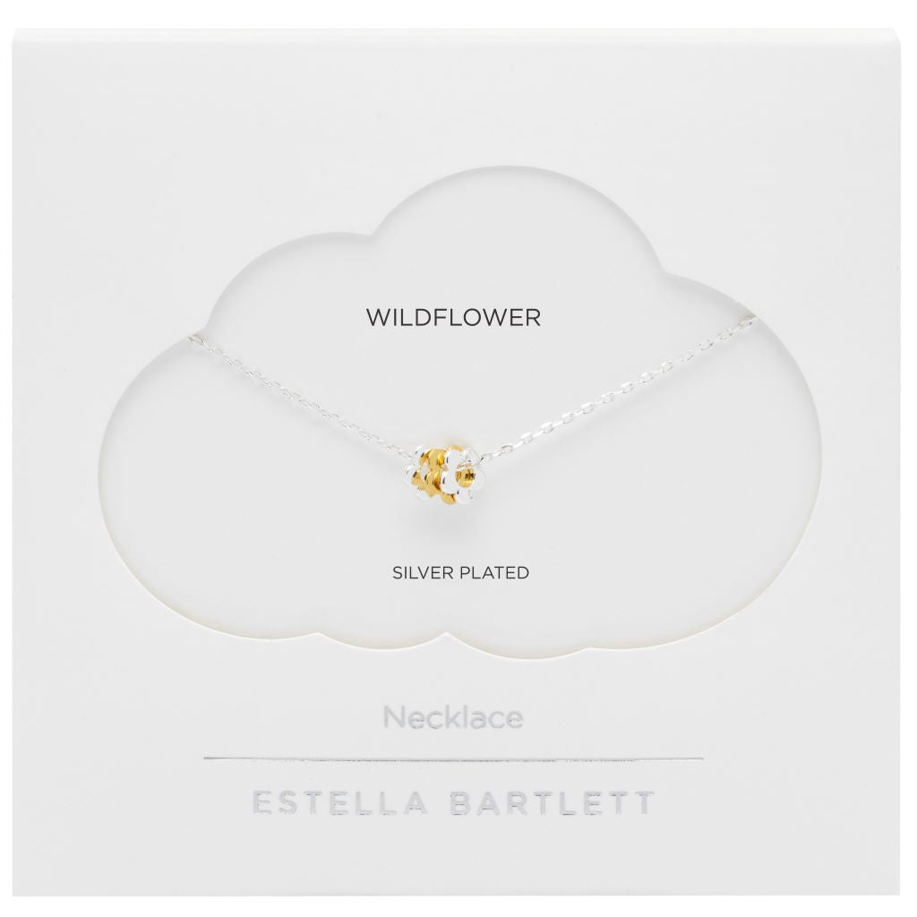 Silver-plated necklace featuring a cluster of small, silver and gold flowers as a pendant.