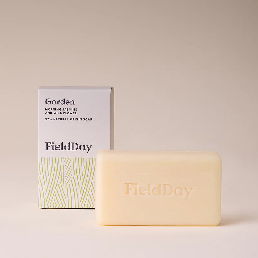 FieldDay soap bar and packaging on a beige background