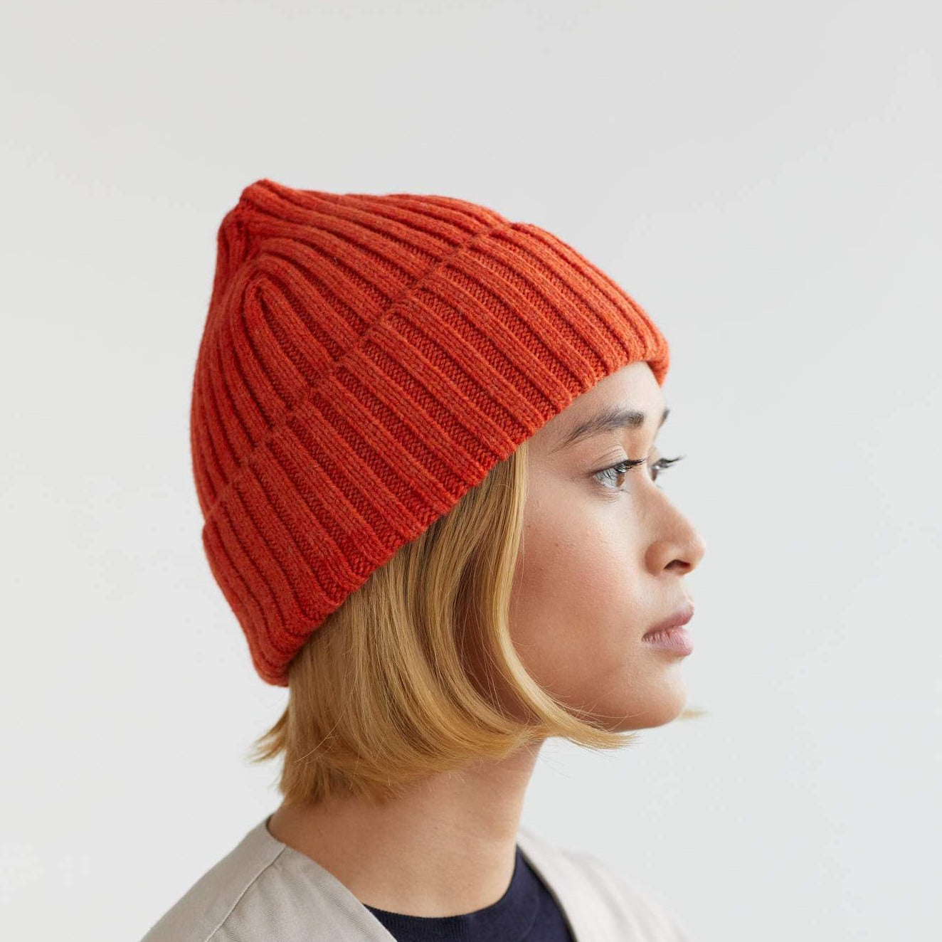 Ribbed knit beanie in burnt orange.