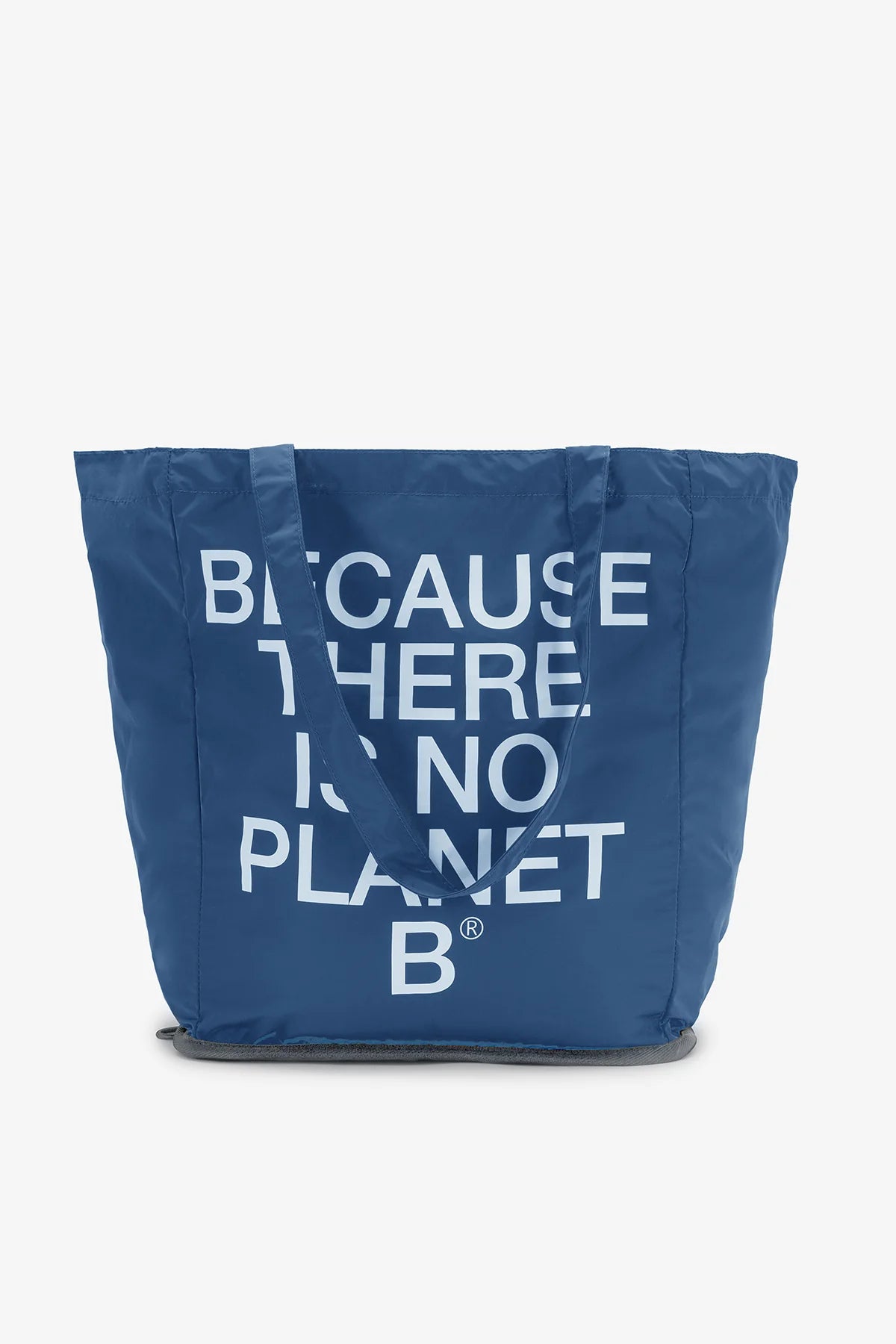 Blue tote bag with the text "BECAUSE THERE IS NO PLANET B" printed on it in white.