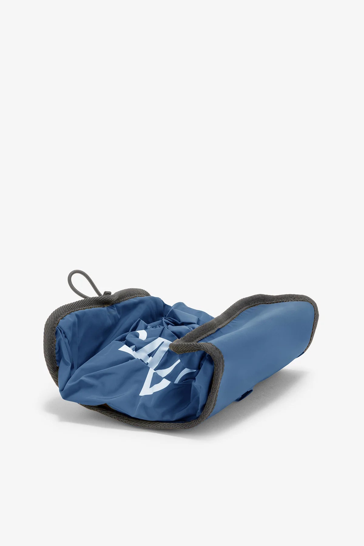 Blue foldable shopping bag with gray trim and partially visible white logo.