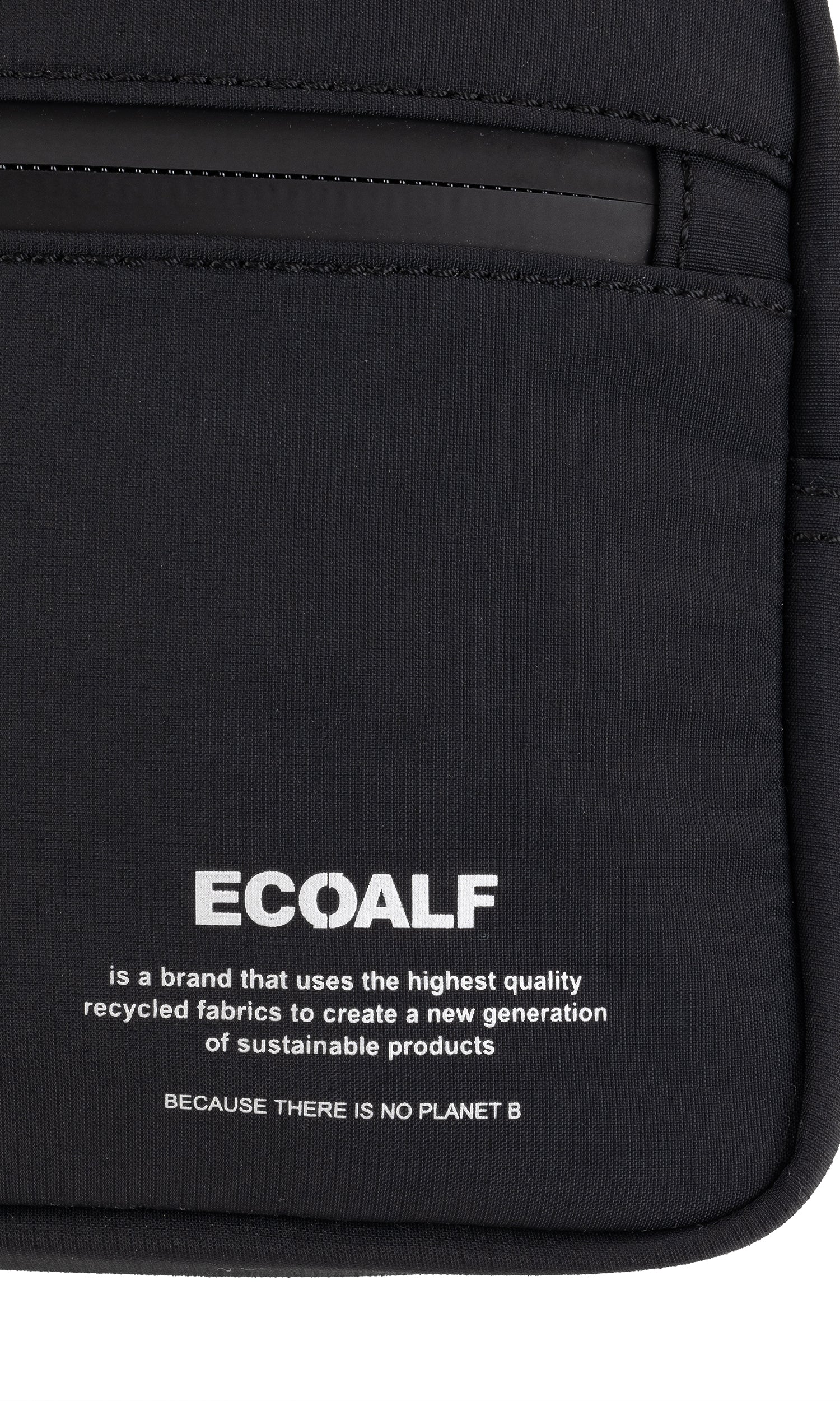 Black ECOALF crossbody bag made from recycled fabrics. The brand's mission statement is printed on the bag.