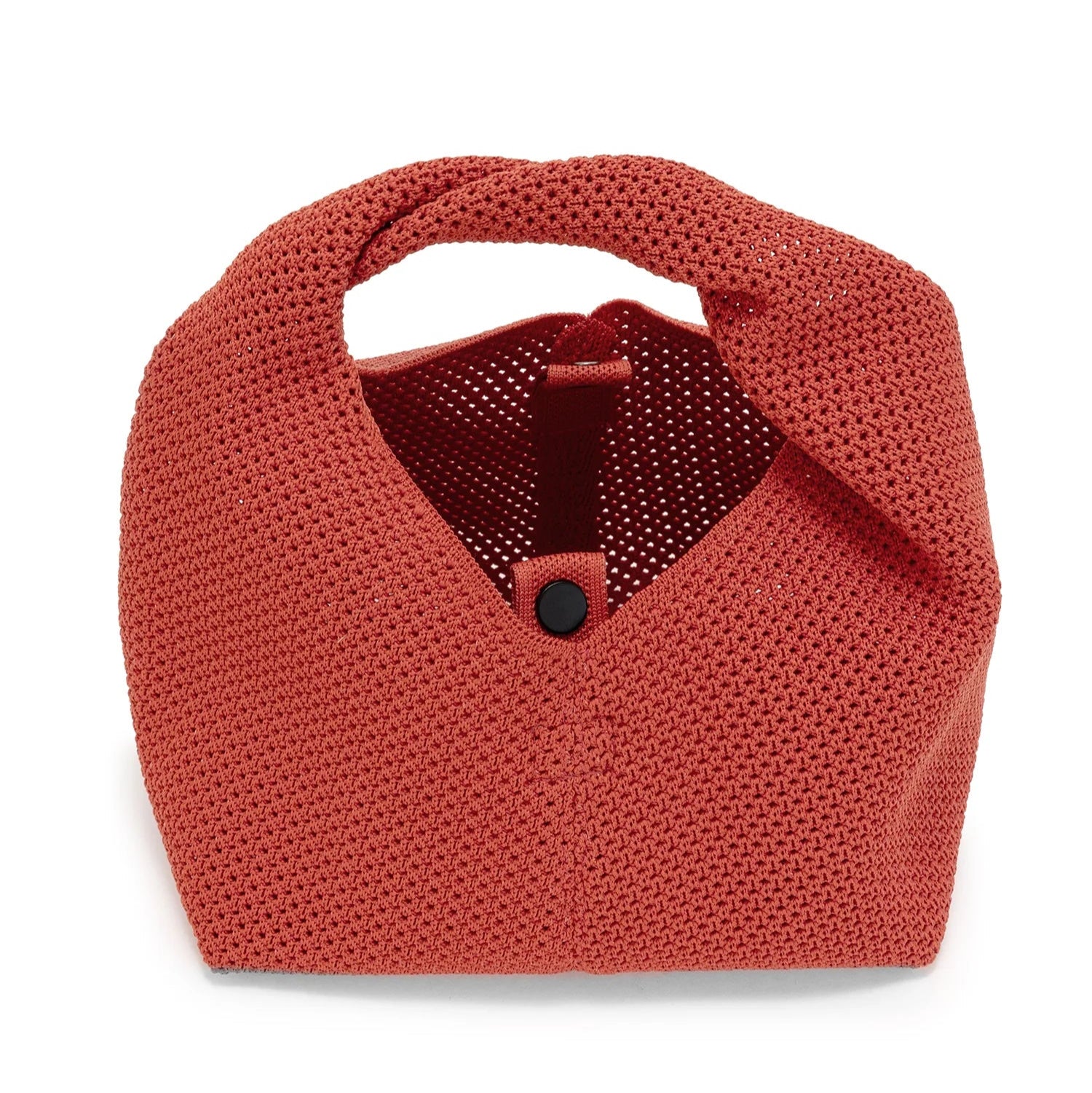 Terracotta-colored crocheted handbag with a single top handle and small black clasp.