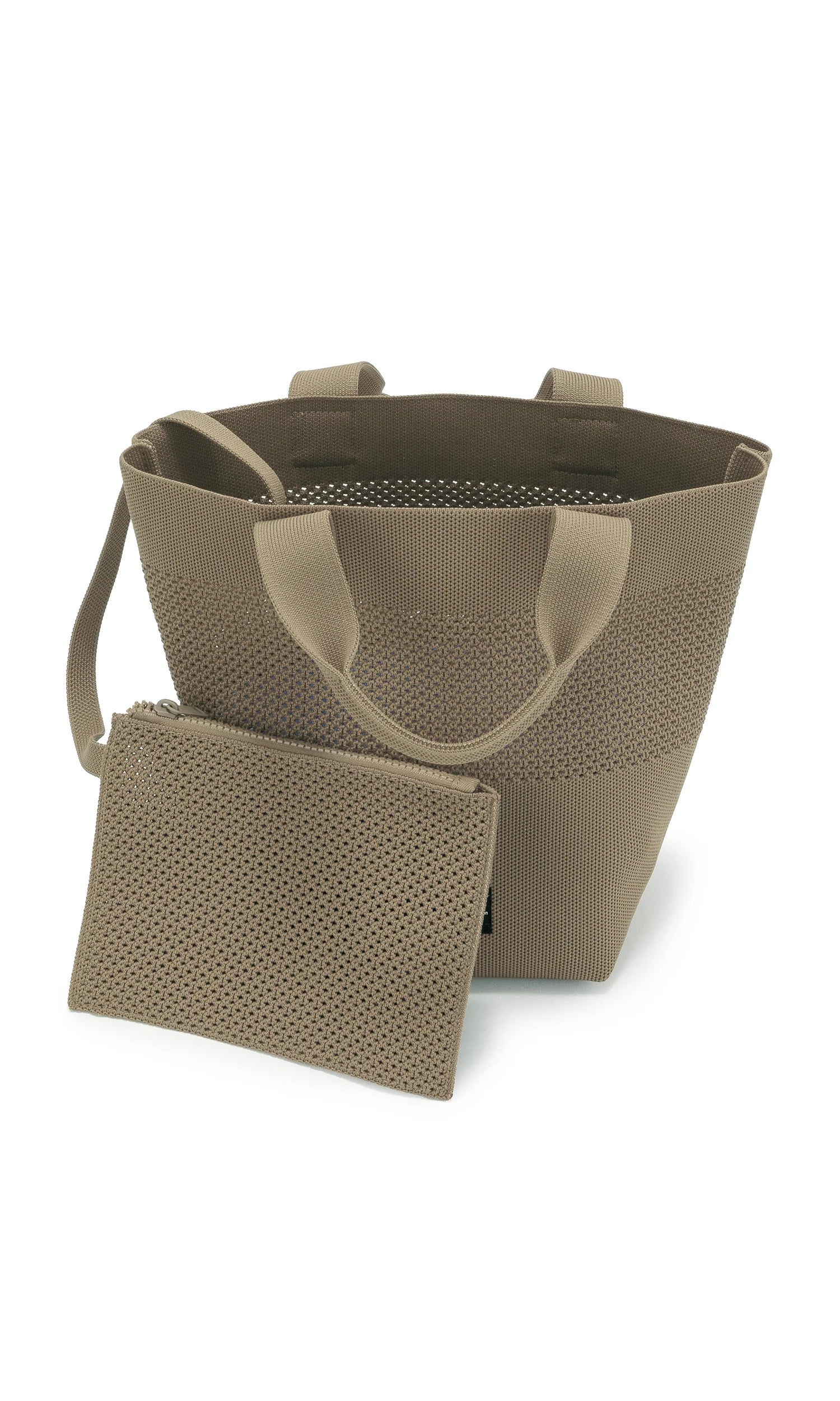 Taupe knitted tote bag with matching zippered pouch. The bag features short handles and an open top.