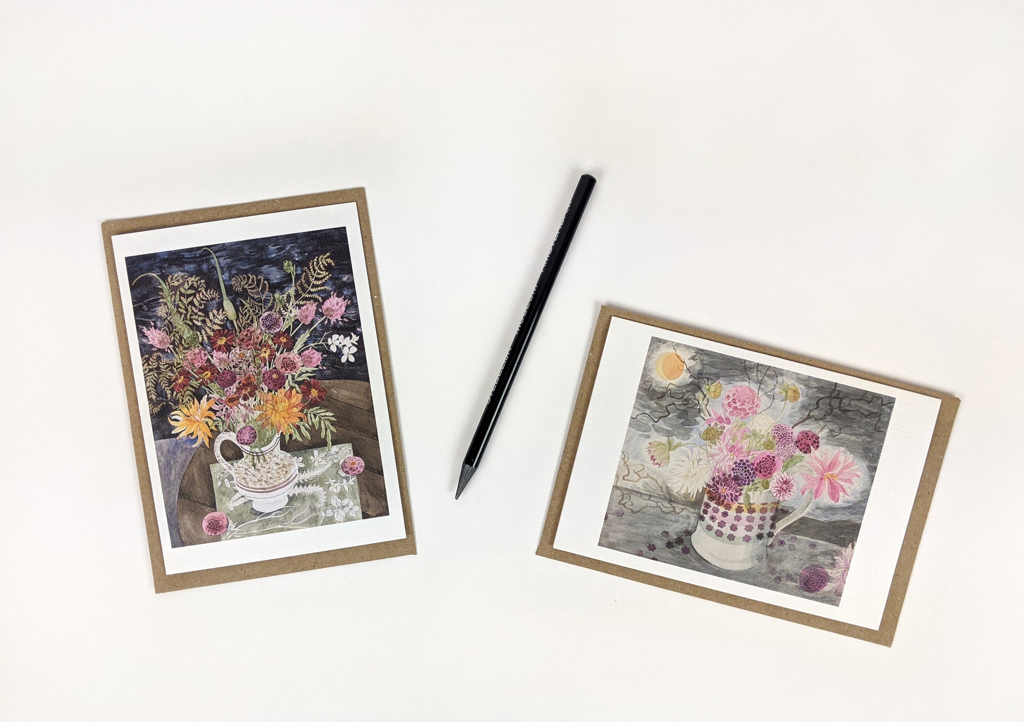 Two floral greeting cards featuring watercolor paintings of flower arrangements in vintage-style pitchers.