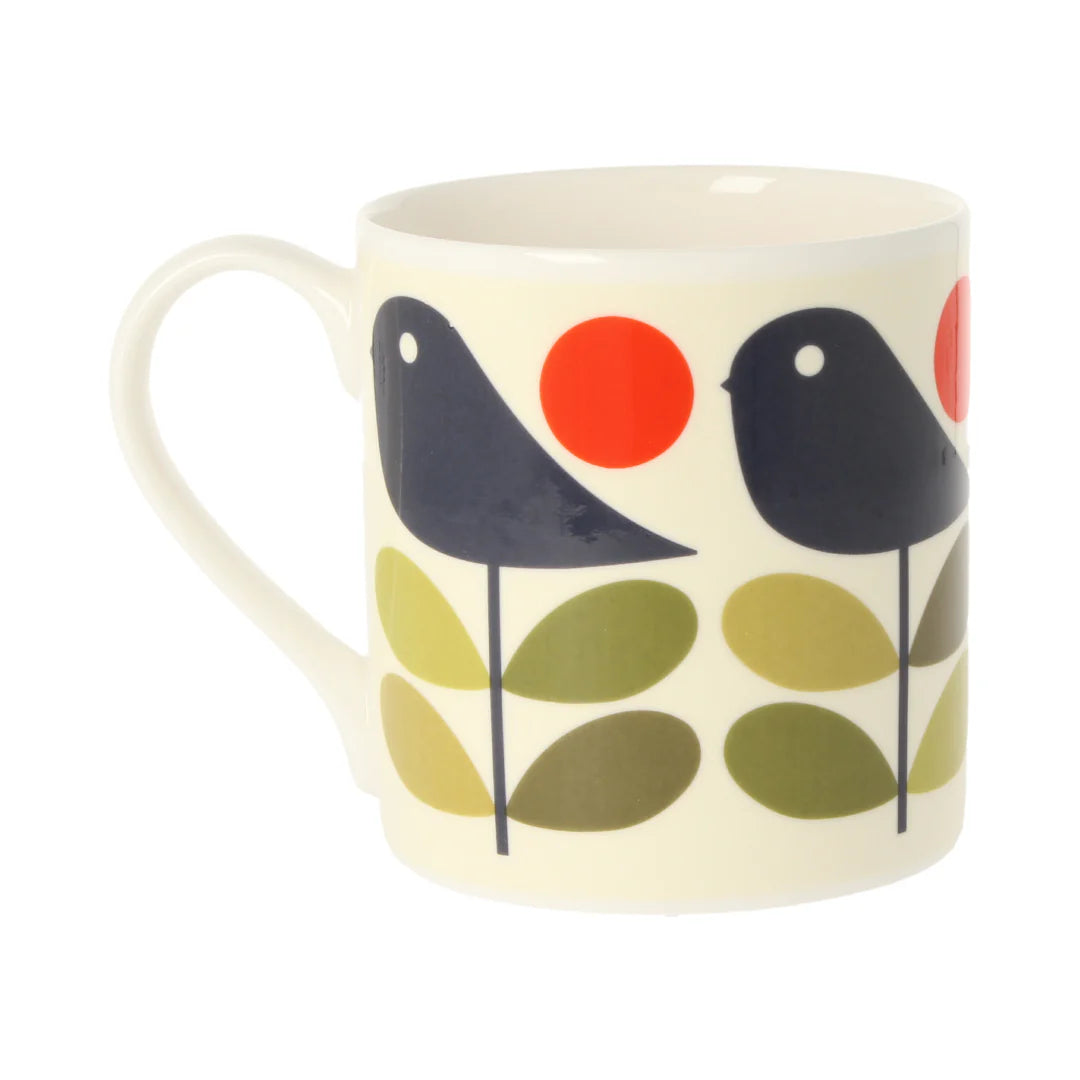 Mug with bird and leaf design on a white background