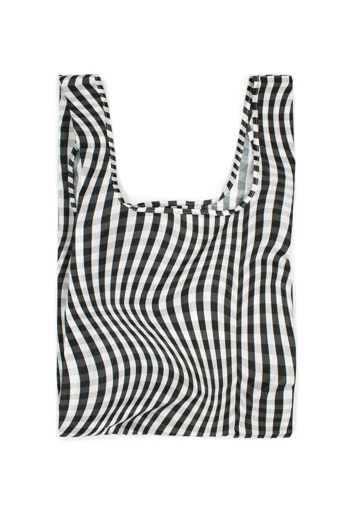 Reusable shopping bag with black and white wavy striped pattern.