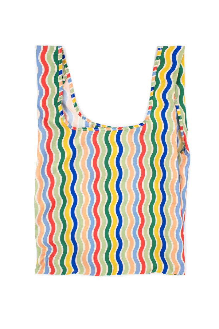 Reusable shopping bag with multicolored wavy stripes.