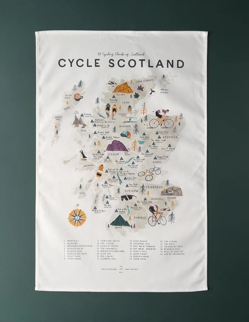 Illustrated tea towel featuring a map of Scotland highlighting 30 cycling climbs.