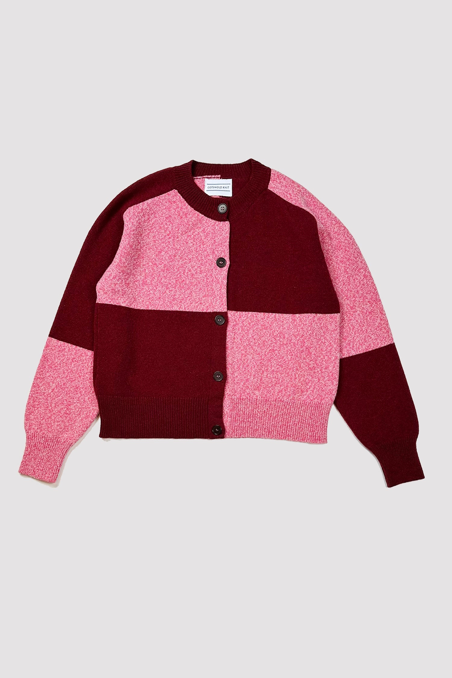 Color-blocked women's cardigan in maroon and pink speckled knit.  Button front closure.