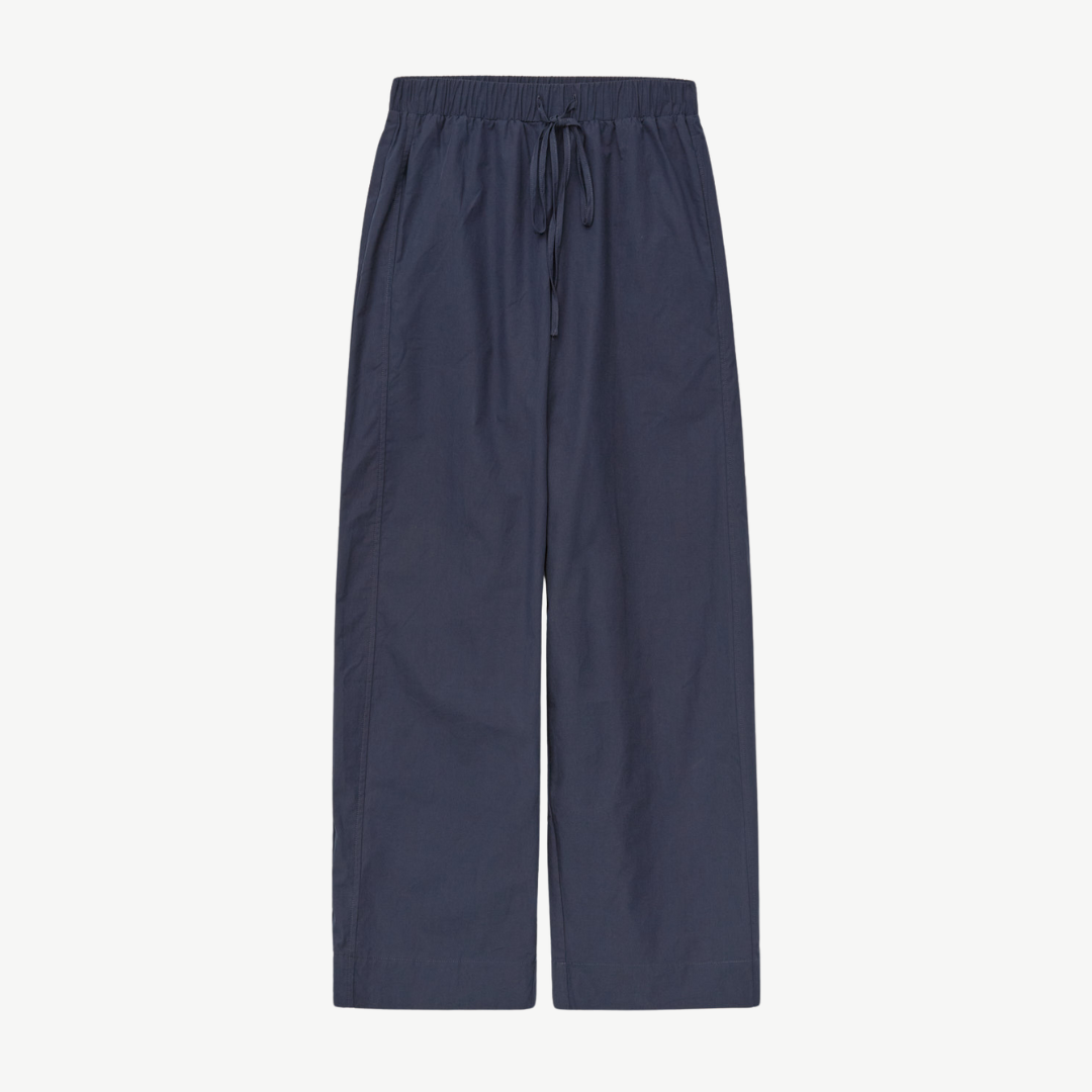 Dark blue wide-leg pants with an elastic waistband and drawstring.