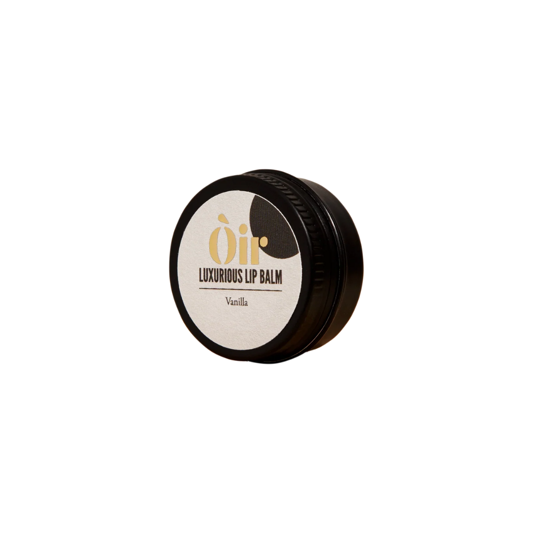 Lip balm container with 'Oii' branding on a white background