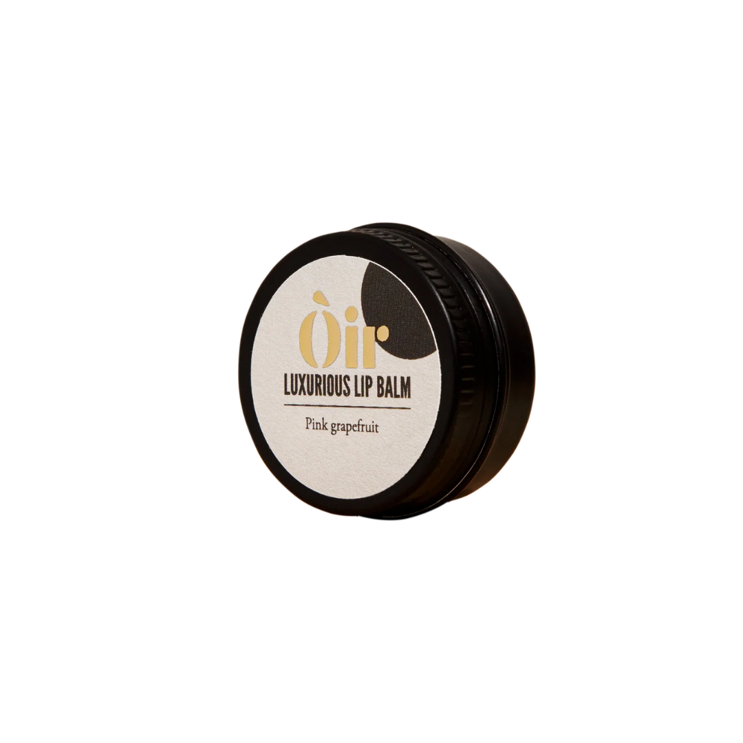 Luxurious lip balm container with 'Oii' branding on a white background