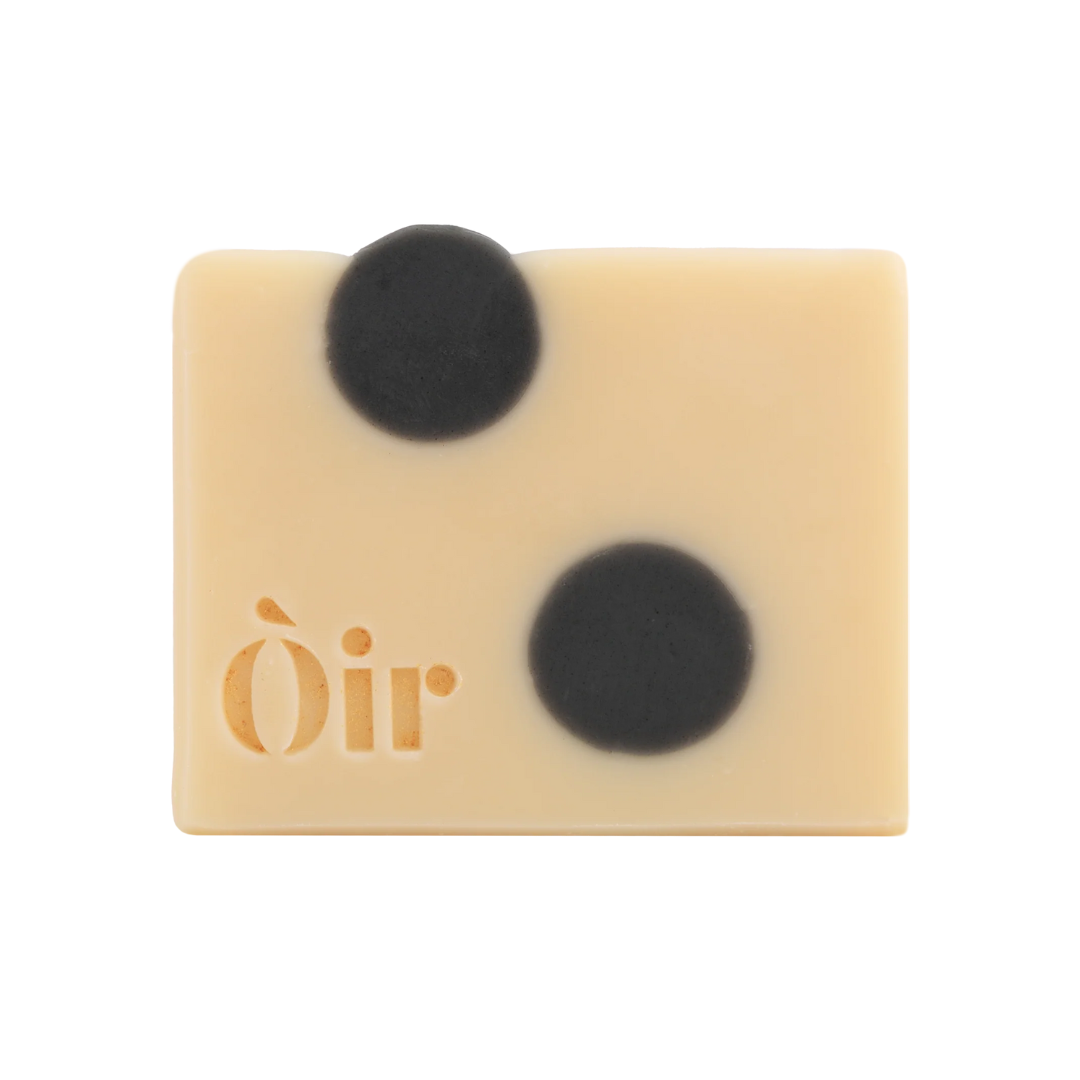Bar of Oir Soap on a white background. Scent Profile of Lemongrass, Pink Grapefruit, Clary Sage and Rosemary.