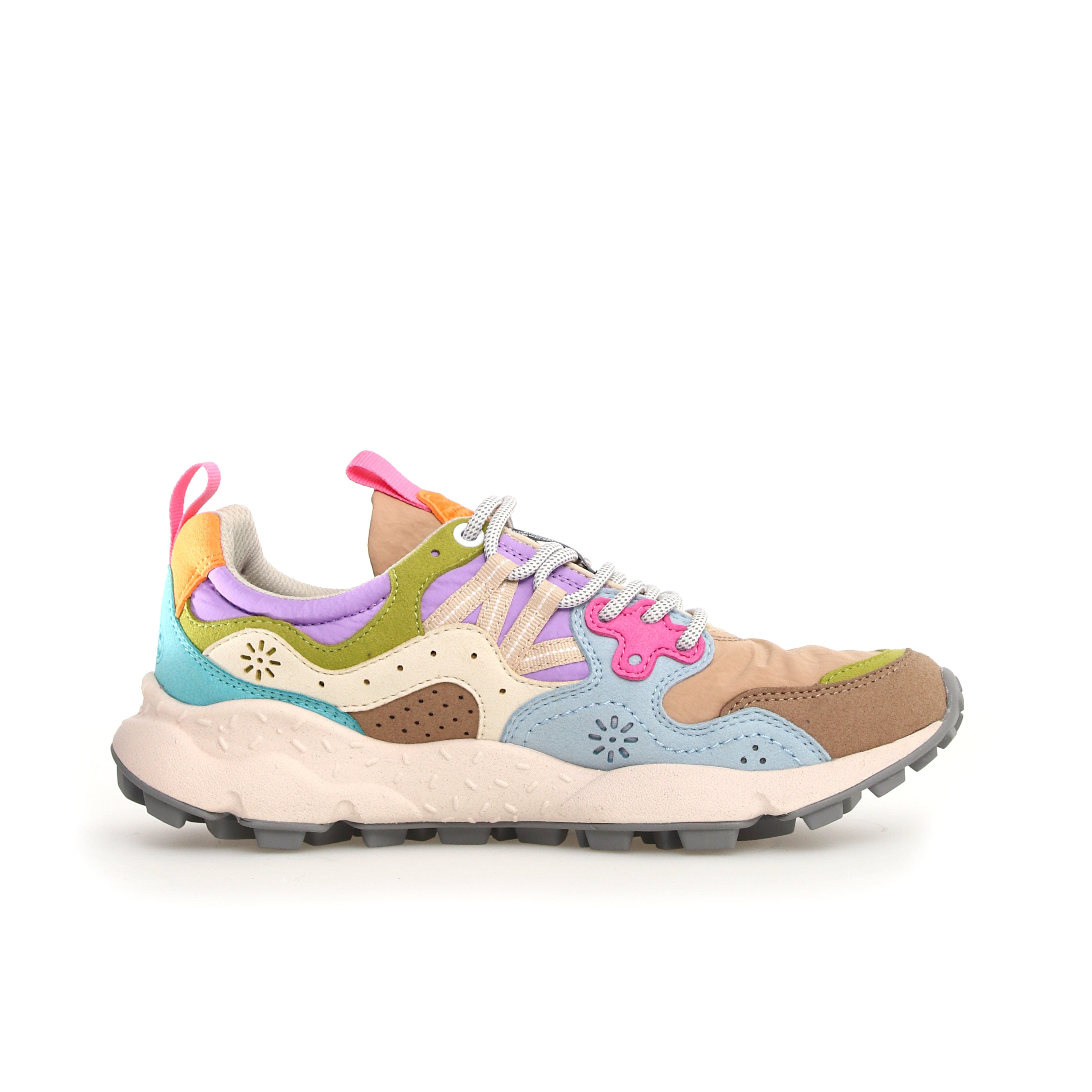 Multicolored low-top sneaker with chunky sole, featuring pastel blue, purple, green, and brown suede and textile panels.