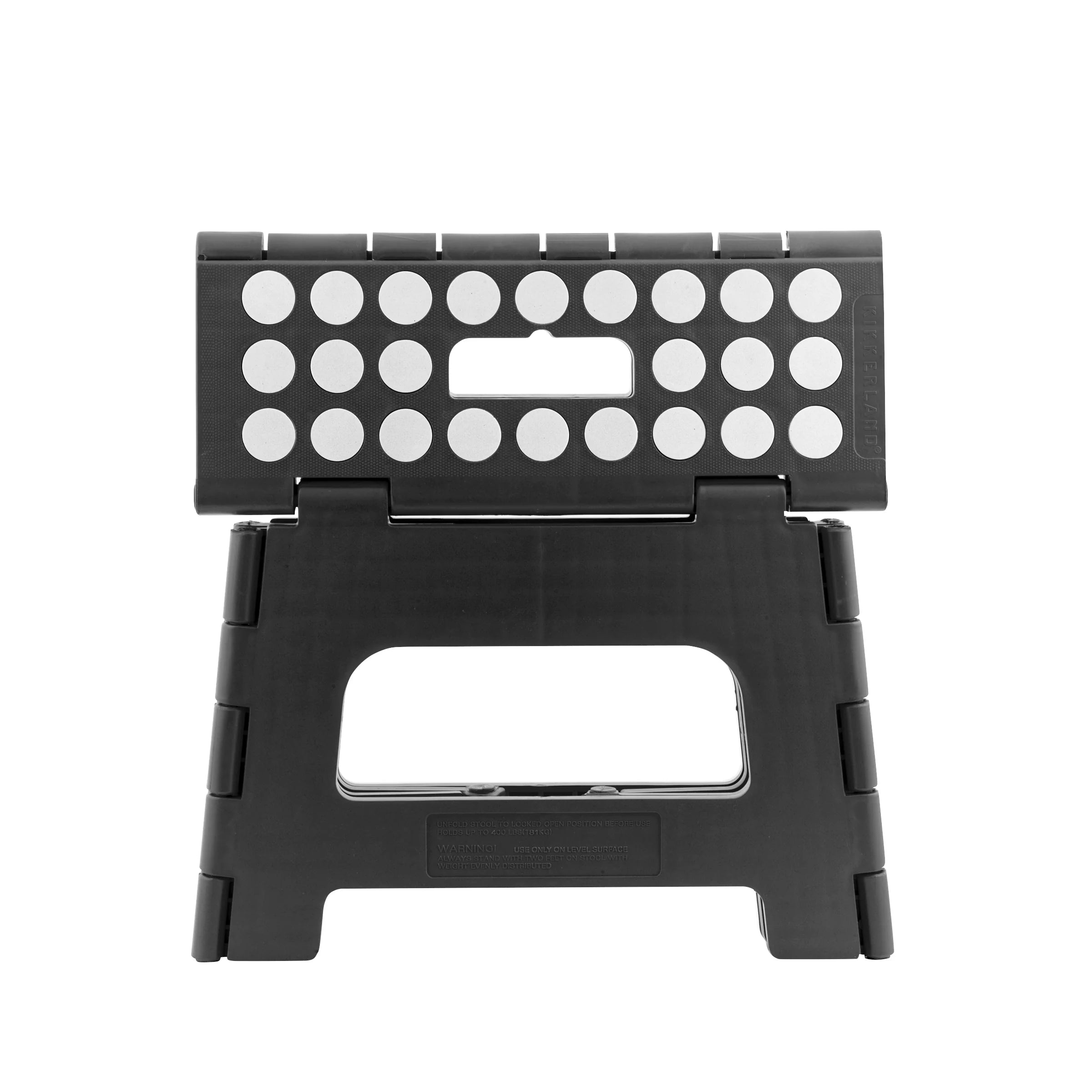 Black plastic folding step stool with textured top surface featuring circular indentations and a central cutout.