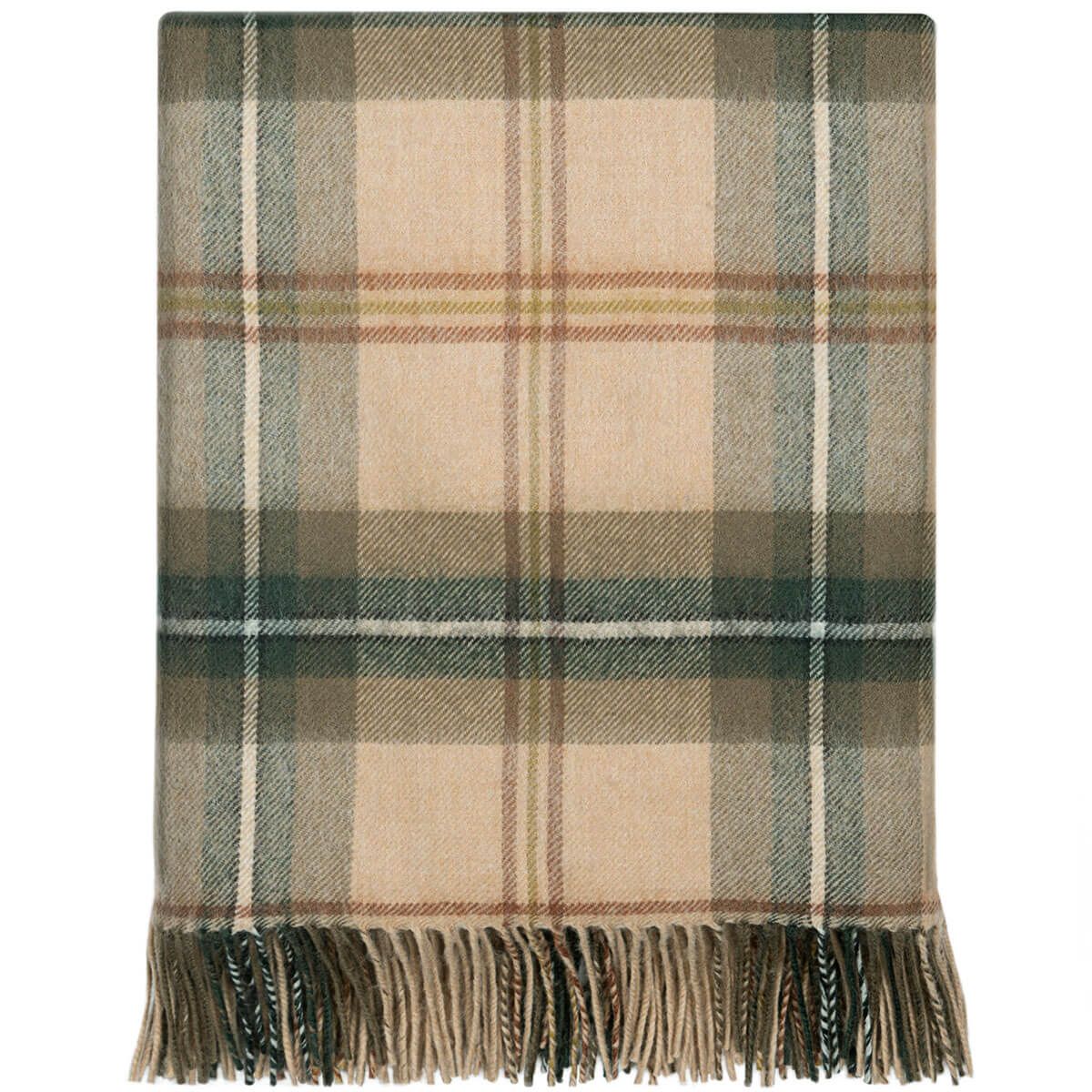 Beige and green plaid throw blanket with fringe.