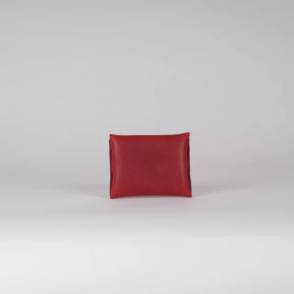 Red leather square wallet.
