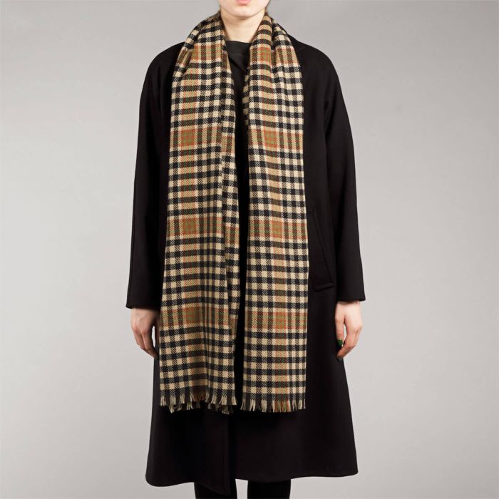 Long beige, black, and olive green plaid wool scarf.