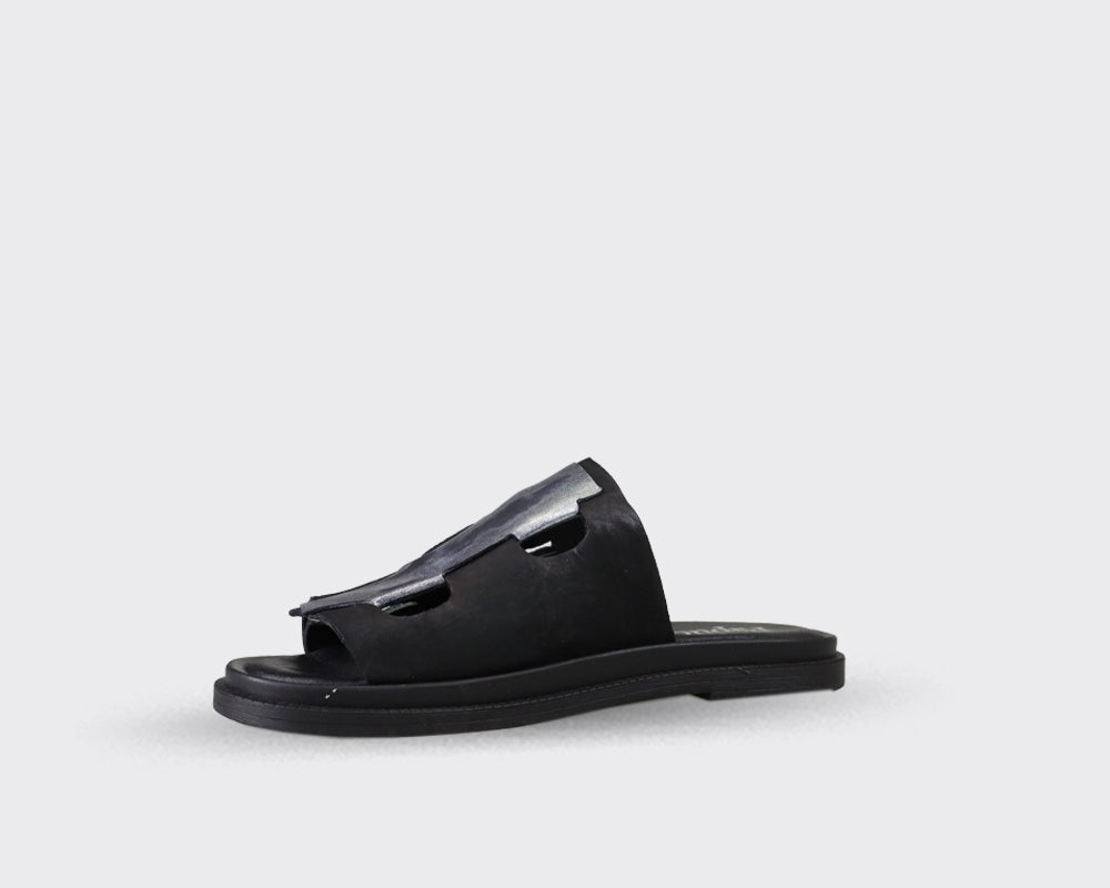 Black leather slide sandal with cut-out detailing and a flat sole.