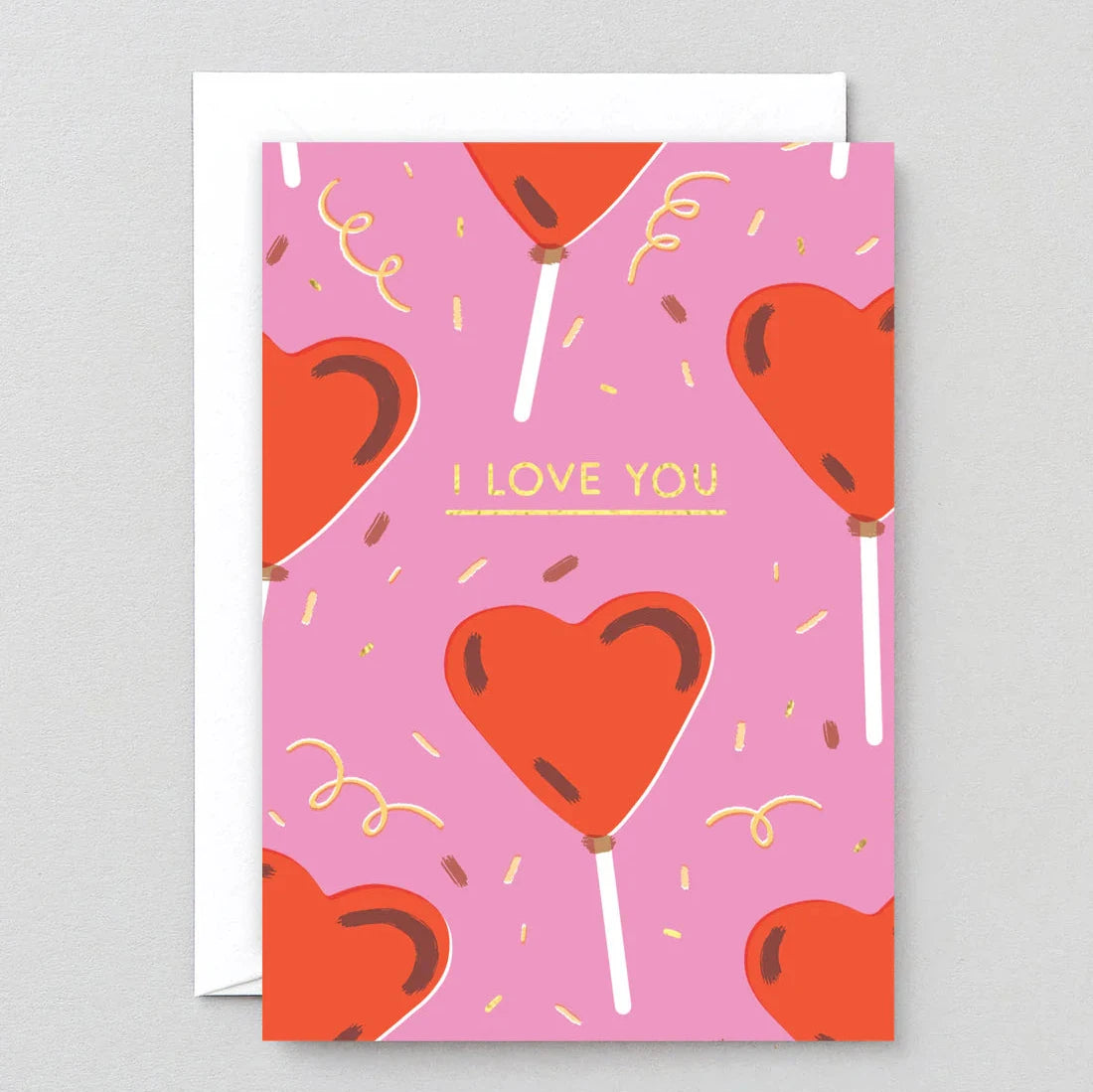 Heart-shaped lollipop Valentine's Day card with "I LOVE YOU" text on a pink background.