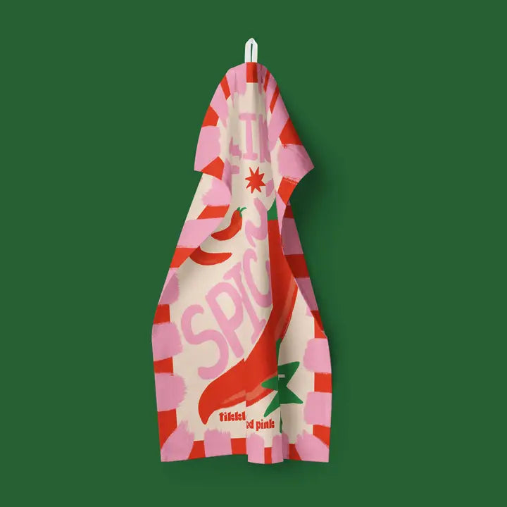 Kitchen tea towel featuring a large red chili pepper and the word "Spicy" in pink lettering, with pink and red stripes.
