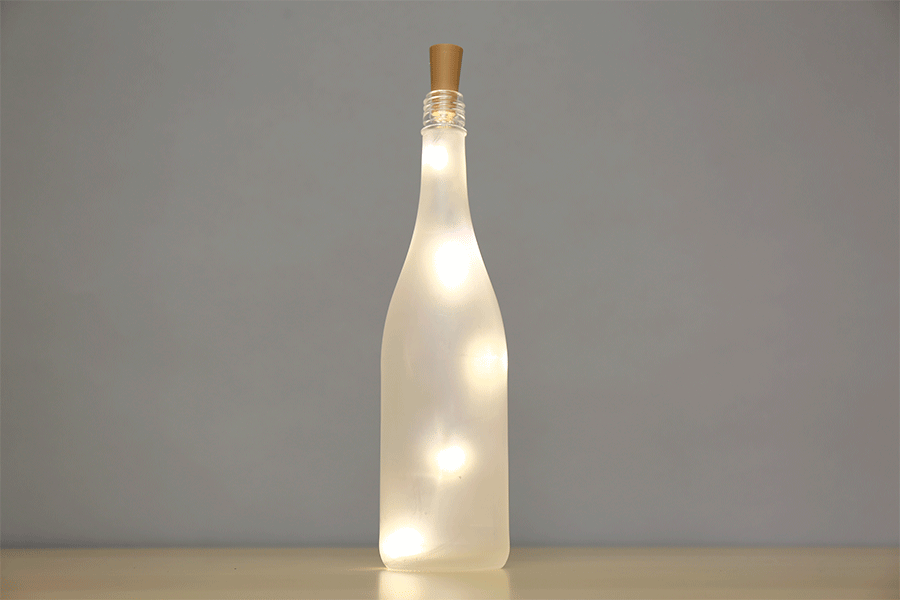 Glass bottle with lights in it