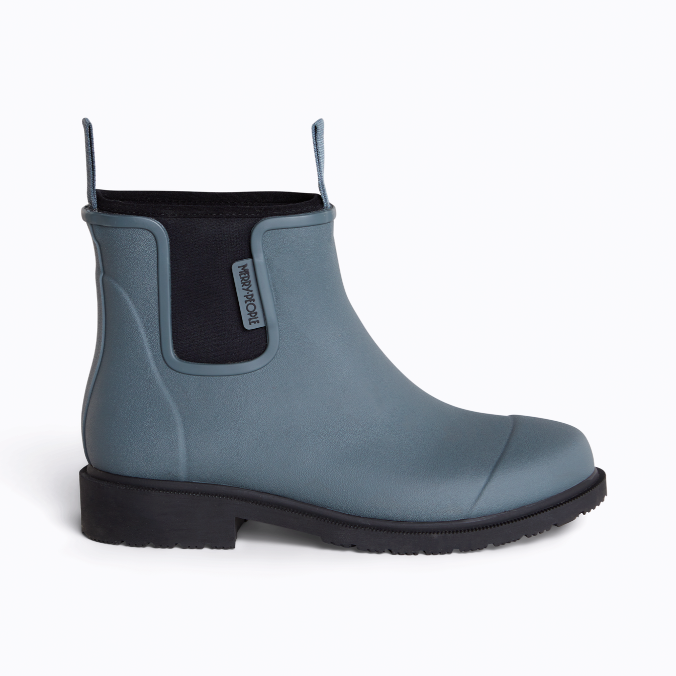 Dusty blue rubber ankle rain boot with black sole and pull tabs.  Merry People logo visible on the shaft.