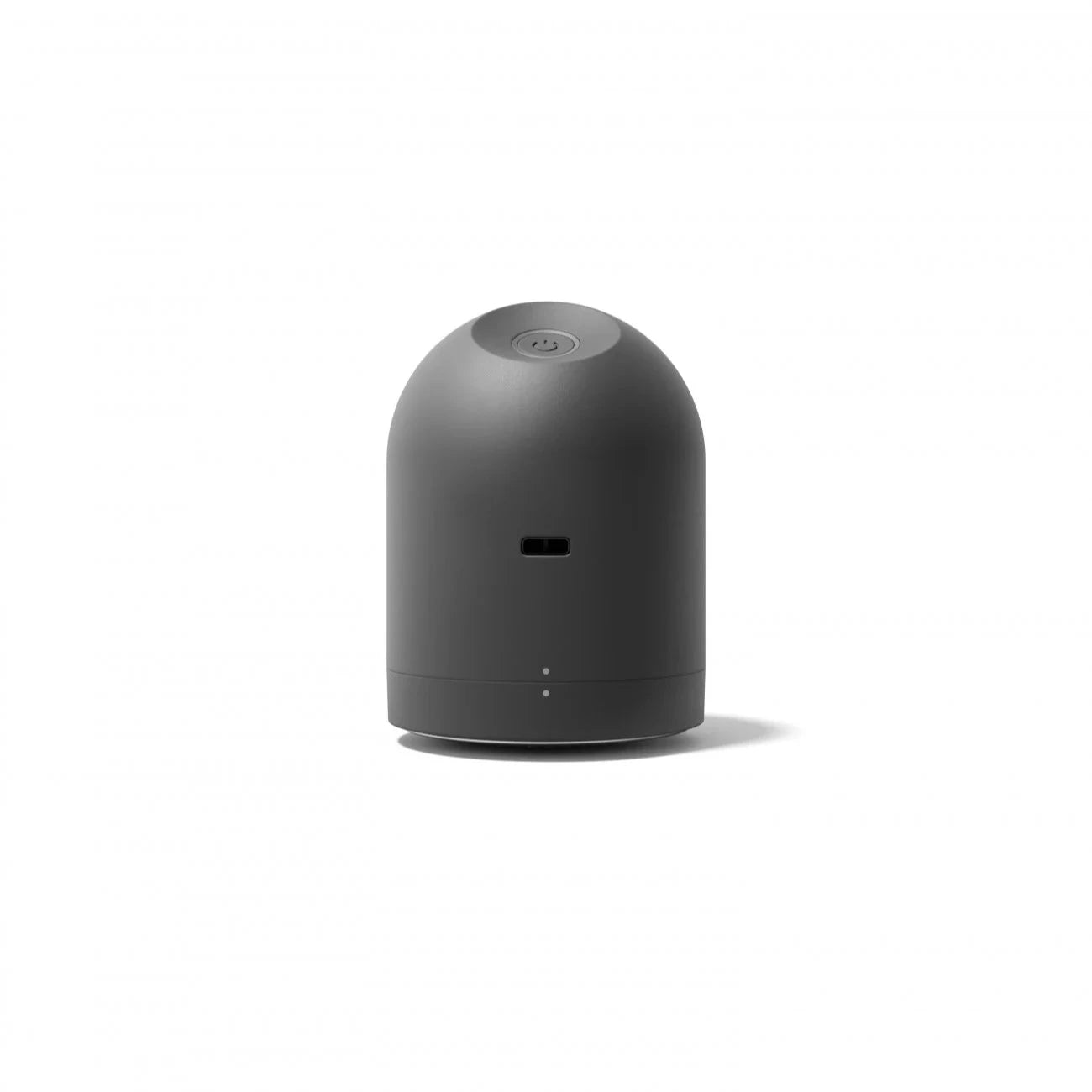 Dark gray cylindrical device with rounded top, small power button, and subtle indicator lights.